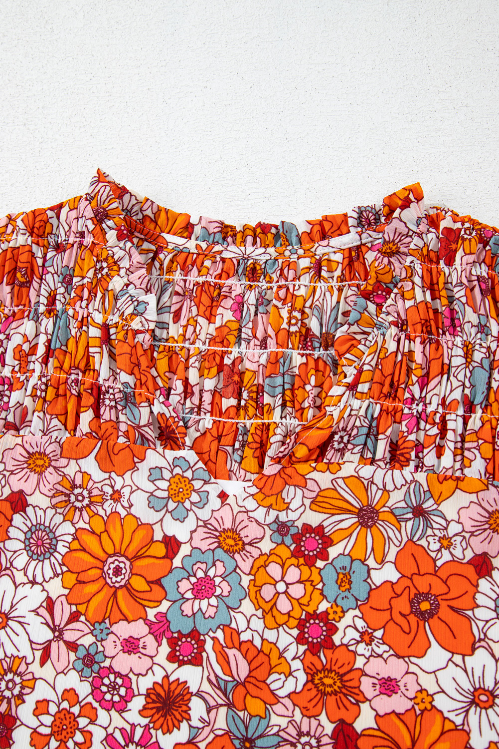 Women's Floral V-Neck Blouse – Pleated Ruffle Short Sleeve Top - Detail View 10 Women's Floral V-Neck Blouse – Pleated Ruffle Short Sleeve Top - Detail View 10