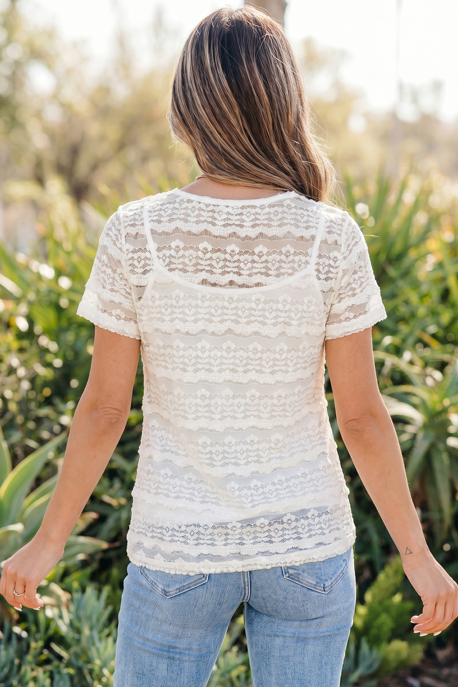 Elegant White Sheer Lace Top for Women – Short Sleeve Round Neck Blouse, Versatile Summer Style - Detail View 2 Elegant White Sheer Lace Top for Women – Short Sleeve Round Neck Blouse, Versatile Summer Style - Detail View 2