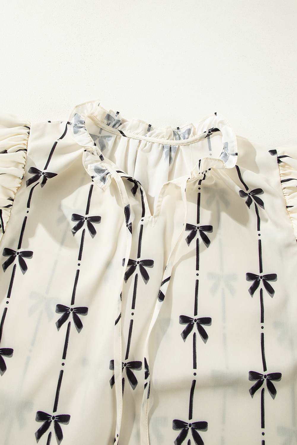 Women's Beige Bow Printed Ruffled Bubble Sleeve Tied Notched V Neck Blouse - Cute & Feminine - Detail View 13 Women's Beige Bow Printed Ruffled Bubble Sleeve Tied Notched V Neck Blouse - Cute & Feminine - Detail View 13