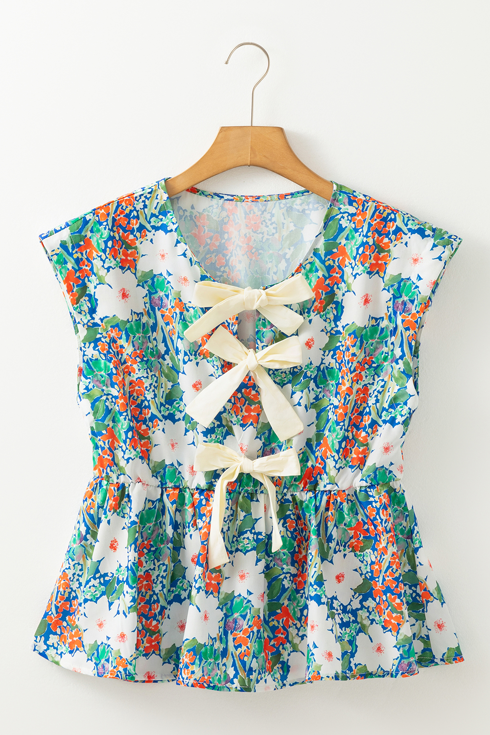 Flattering Green Floral Peplum Top - Perfect for Daily Wear and Warm Weather - Detail View 7 Flattering Green Floral Peplum Top - Perfect for Daily Wear and Warm Weather - Detail View 7