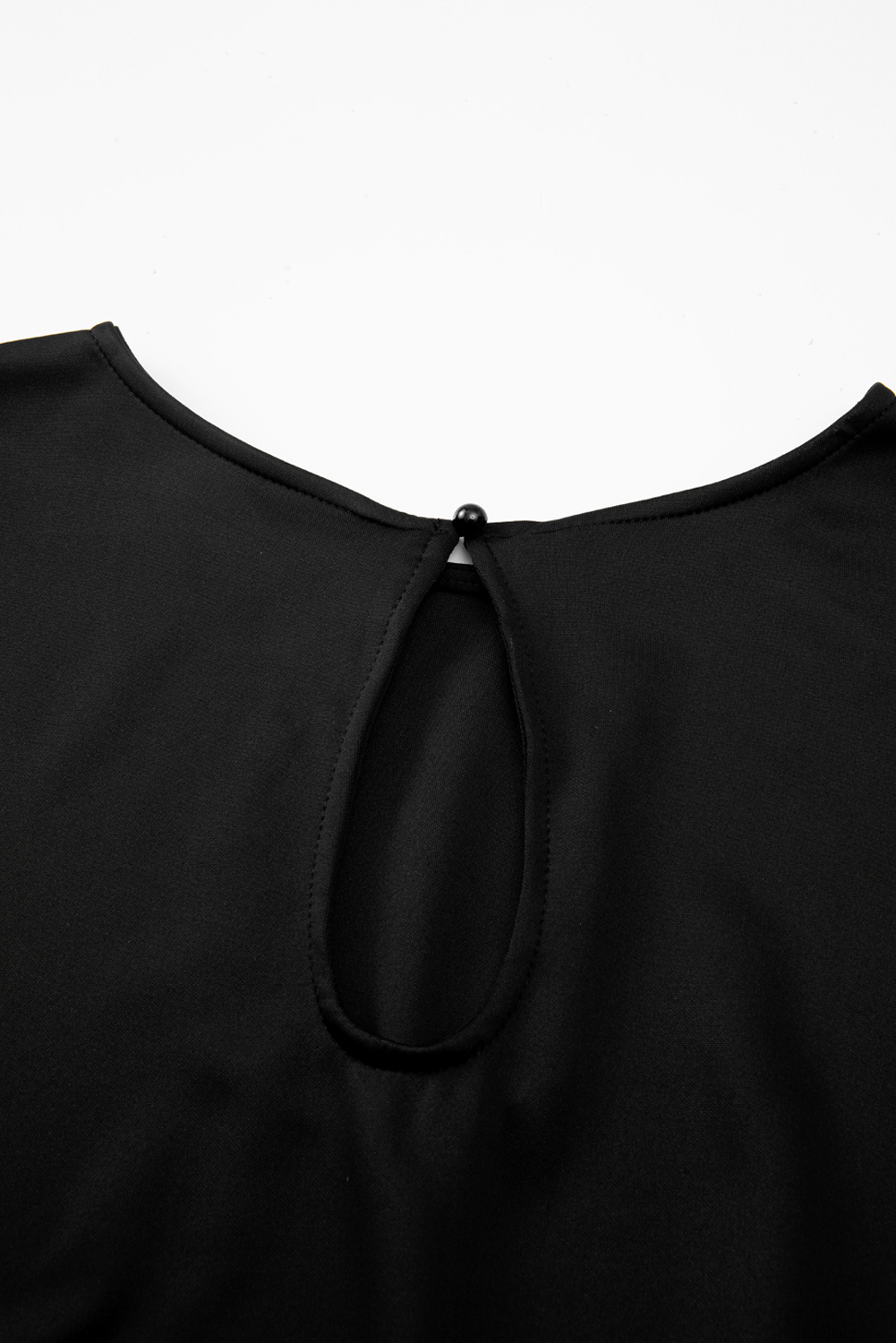 Summer-Ready Black Jumpsuit with Belted Waist and Elegant Dolman Sleeves - Detail View 11 Summer-Ready Black Jumpsuit with Belted Waist and Elegant Dolman Sleeves - Detail View 11