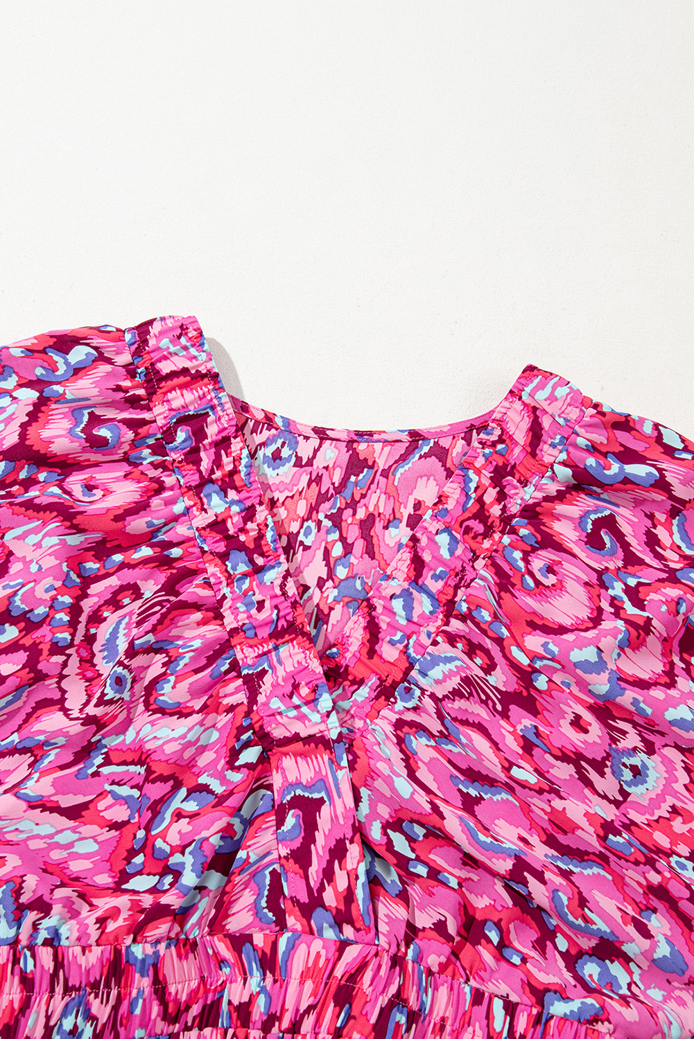 Chic and Comfortable Pink Abstract Print Romper with Puff Sleeves and V Neckline - Detail View 6 Chic and Comfortable Pink Abstract Print Romper with Puff Sleeves and V Neckline - Detail View 6