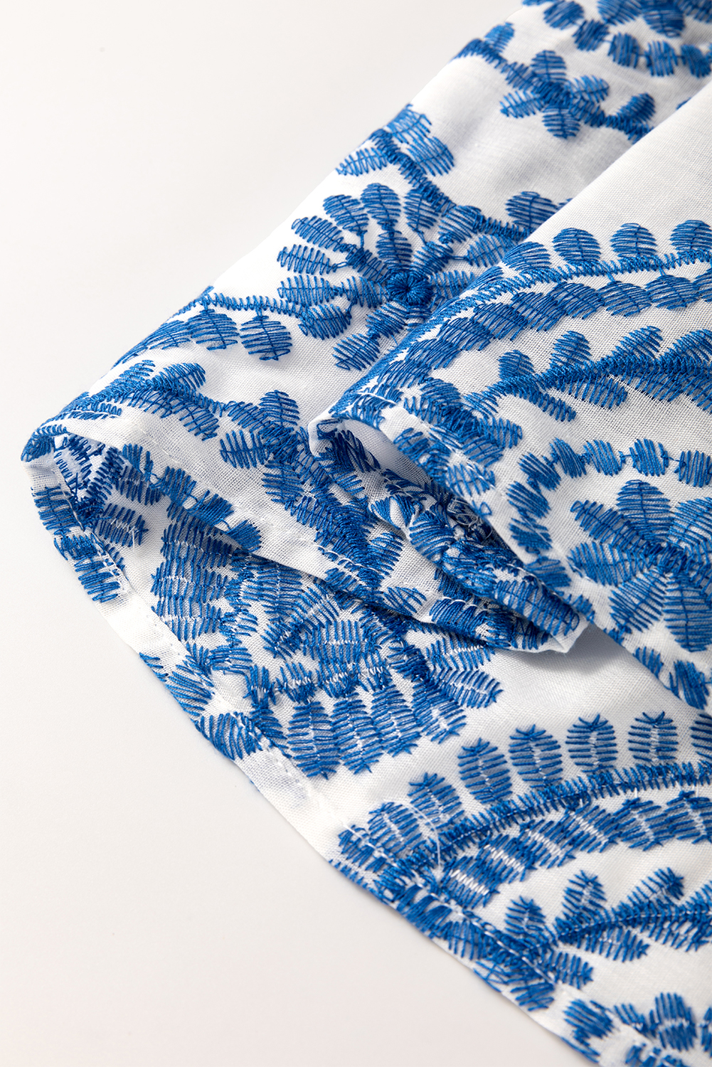 Effortless Summer Look: Blue Crew Neck Blouse with Feminine Flutter Sleeves - Detail View 7 Effortless Summer Look: Blue Crew Neck Blouse with Feminine Flutter Sleeves - Detail View 7