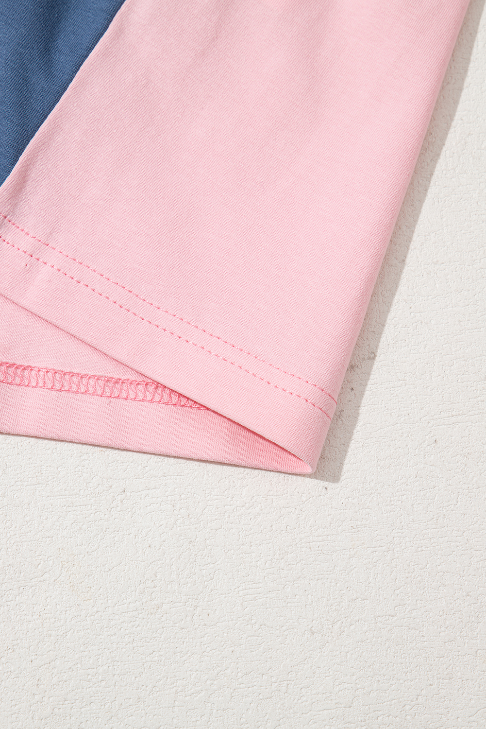 Women's Pink Colorblock Long Sleeve Henley Top with Button Detailing - Detail View 9 Women's Pink Colorblock Long Sleeve Henley Top with Button Detailing - Detail View 9