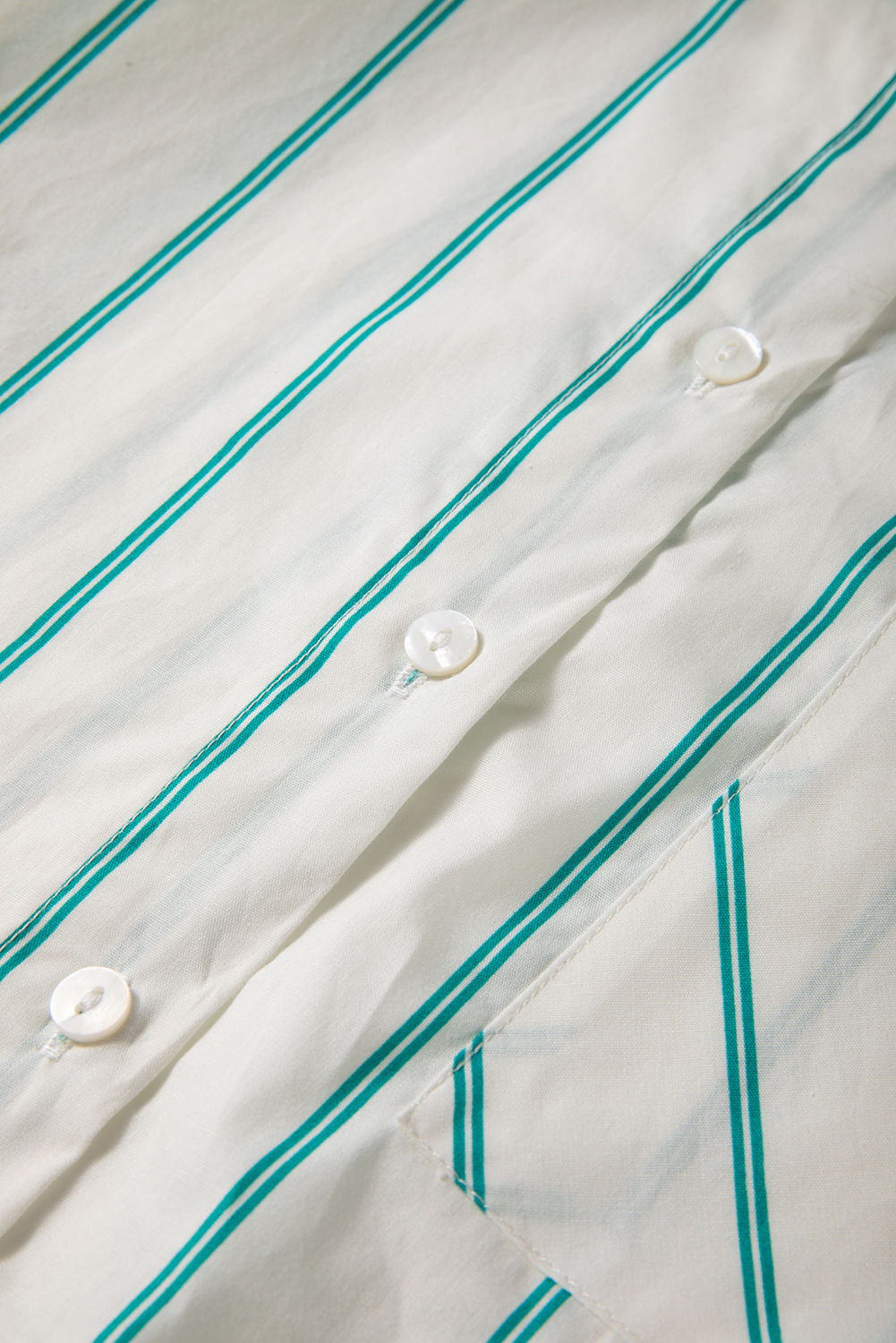 Casual and Trendy Mint Green Striped Mini Dress with Button Design - Detail View 10 Casual and Trendy Mint Green Striped Mini Dress with Button Design - Detail View 10