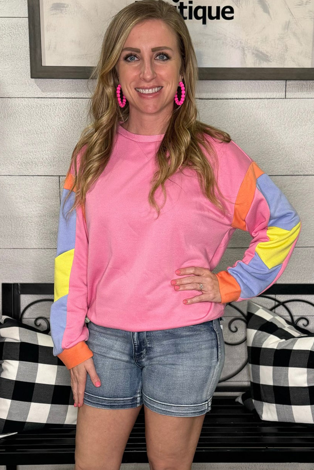 Make a statement with this vibrant Pink Candy Colorblock French Terry Top, designed to add a pop of color to your everyday look. Featuring a unique colorblock design, this playful top offers a chic and effortless way to elevate your style. The long sleeves provide extra coverage and comfort, while the round neckline and shift silhouette ensure a flattering fit. Whether paired with jeans or a skirt, this top is perfect for creating a versatile and stylish ensemble. With its 65% polyester and 35% cotton construction, this top is both durable and soft to the touch. Add this colorful top to your wardrobe for a unique and eye-catching addition. - Detail View 4 Make a statement with this vibrant Pink Candy Colorblock French Terry Top, designed to add a pop of color to your everyday look. Featuring a unique colorblock design, this playful top offers a chic and effortless way to elevate your style. The long sleeves provide extra coverage and comfort, while the round neckline and shift silhouette ensure a flattering fit. Whether paired with jeans or a skirt, this top is perfect for creating a versatile and stylish ensemble. With its 65% polyester and 35% cotton construction, this top is both durable and soft to the touch. Add this colorful top to your wardrobe for a unique and eye-catching addition. - Detail View 4
