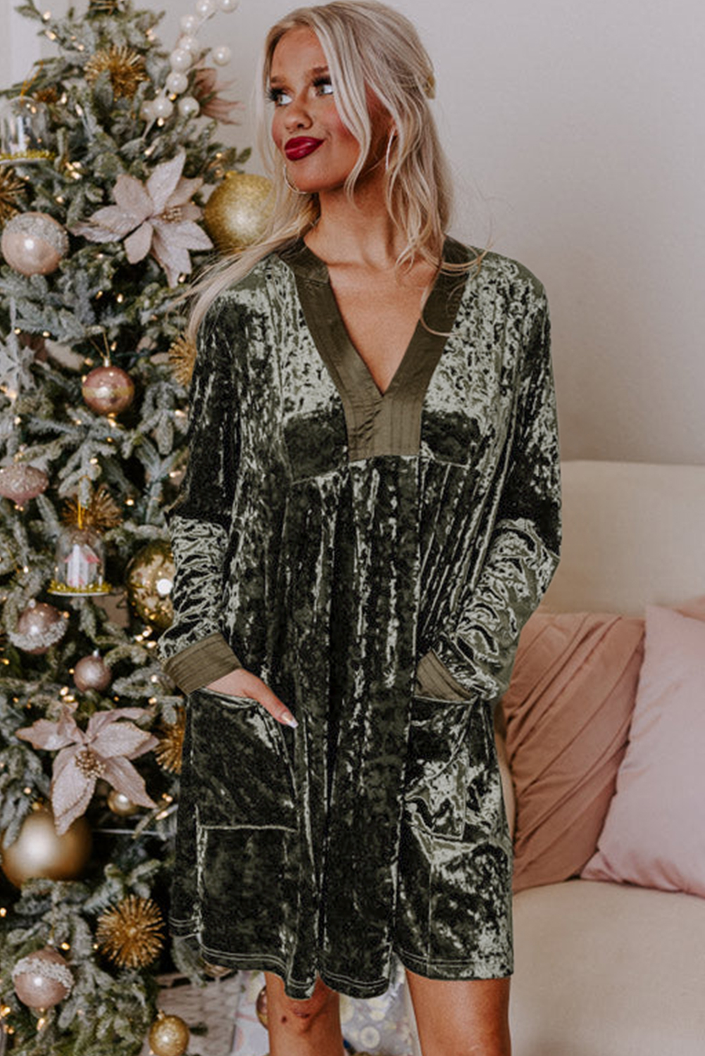 Indulge in the soft and luxurious feel of this Women's Jungle Green Velvet Long Sleeve V Neck Loose Dress with Pockets. The flattering V neckline adds a touch of sophistication, while the loose fit provides a comfortable and relaxed silhouette. The convenient pockets offer a practical and stylish touch, making this dress perfect for daily wear or a special occasion. The solid jungle green color is versatile and easy to style, making it a must-have addition to your wardrobe. The long sleeves and shift silhouette ensure a chic and feminine look, ideal for updating your wardrobe with a stylish and elegant dress. - Detail View 4 Indulge in the soft and luxurious feel of this Women's Jungle Green Velvet Long Sleeve V Neck Loose Dress with Pockets. The flattering V neckline adds a touch of sophistication, while the loose fit provides a comfortable and relaxed silhouette. The convenient pockets offer a practical and stylish touch, making this dress perfect for daily wear or a special occasion. The solid jungle green color is versatile and easy to style, making it a must-have addition to your wardrobe. The long sleeves and shift silhouette ensure a chic and feminine look, ideal for updating your wardrobe with a stylish and elegant dress. - Detail View 4