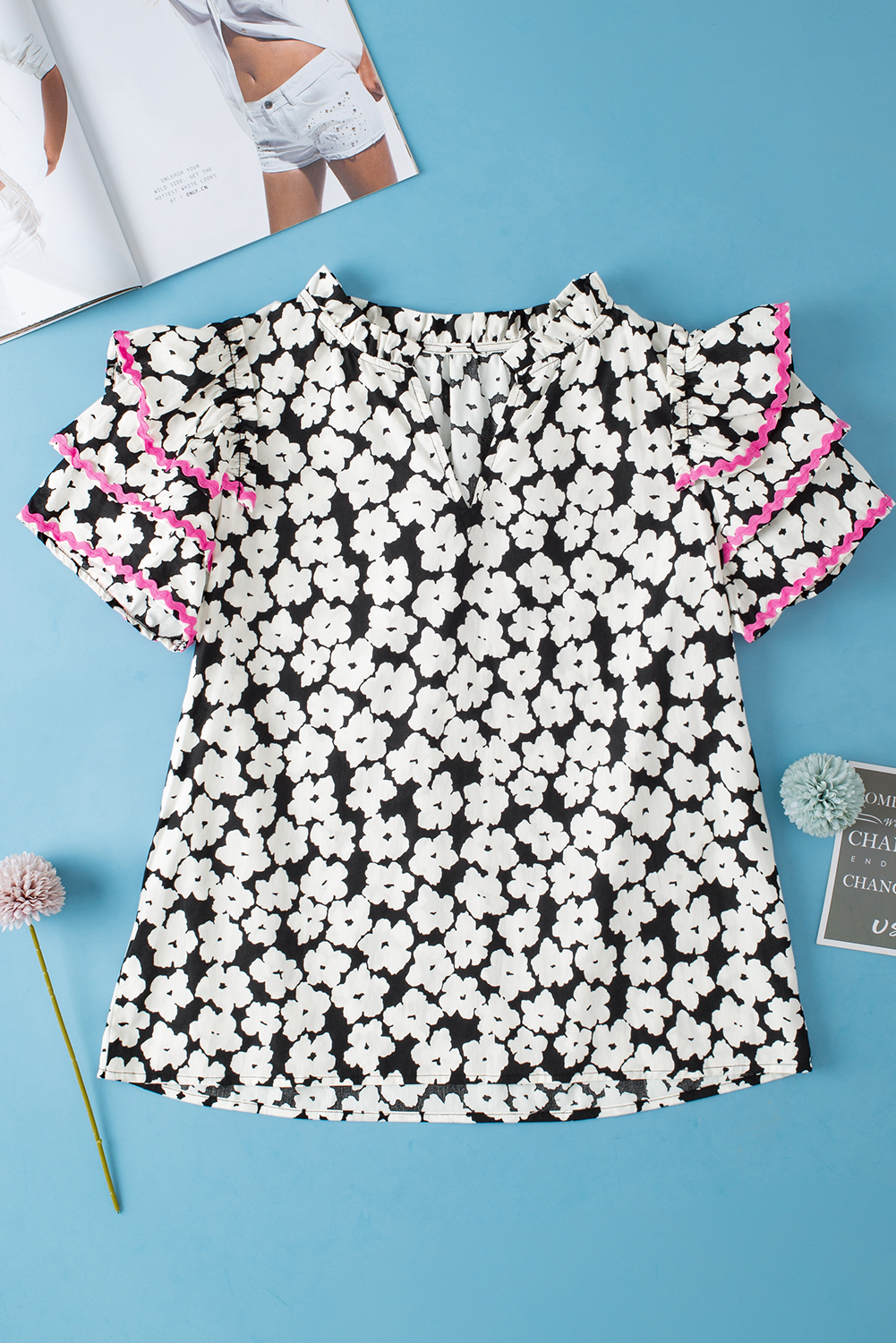 Stylish V-Neck Short Sleeve Blouse: Black Floral with Tiered Ruffle Detail - Detail View 2 Stylish V-Neck Short Sleeve Blouse: Black Floral with Tiered Ruffle Detail - Detail View 2