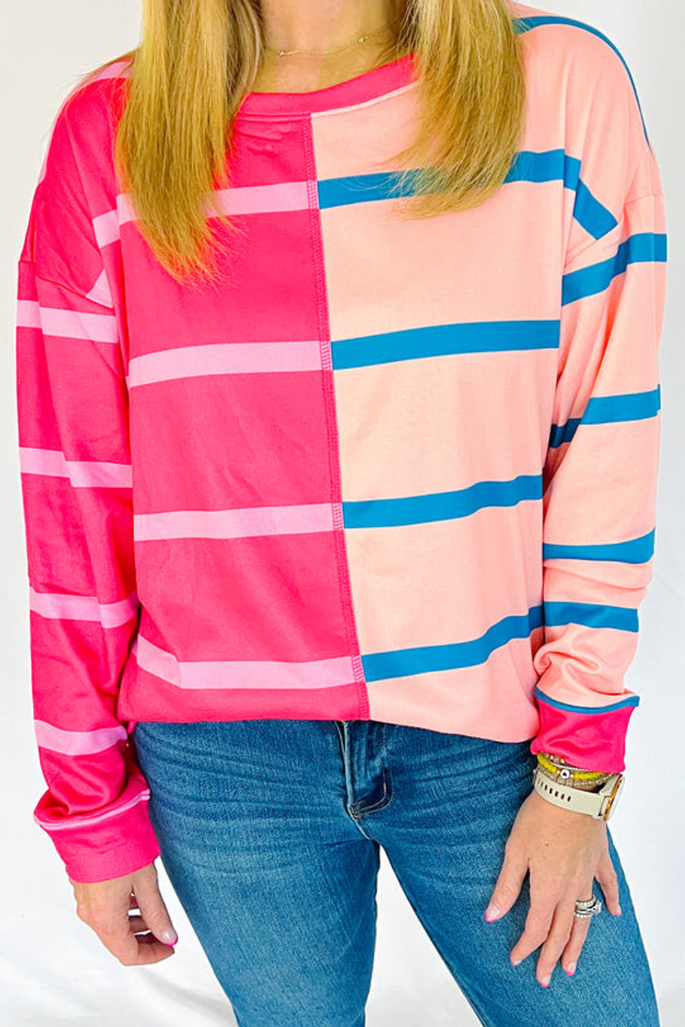 Elevate your wardrobe with this striking Women's Plus Size Rose Stripe Color Block Crewneck Long Sleeve T-Shirt. The vibrant color block design creates a chic and stylish look, while the classic striped pattern adds a touch of sophistication. The classic round neck crewneck design ensures a comfortable and casual fit, perfect for daily wear. The long sleeves design is ideal for transitional seasons, making this t-shirt a must-have for your wardrobe. The plus size range ensures a comfortable fit, with a size inclusive design for all. Pair it with your favorite jeans or leggings for a stylish and effortless look. This t-shirt is perfect for daily wear, holidays, and more, making it a versatile and essential addition to your wardrobe. - Detail View 4 Elevate your wardrobe with this striking Women's Plus Size Rose Stripe Color Block Crewneck Long Sleeve T-Shirt. The vibrant color block design creates a chic and stylish look, while the classic striped pattern adds a touch of sophistication. The classic round neck crewneck design ensures a comfortable and casual fit, perfect for daily wear. The long sleeves design is ideal for transitional seasons, making this t-shirt a must-have for your wardrobe. The plus size range ensures a comfortable fit, with a size inclusive design for all. Pair it with your favorite jeans or leggings for a stylish and effortless look. This t-shirt is perfect for daily wear, holidays, and more, making it a versatile and essential addition to your wardrobe. - Detail View 4