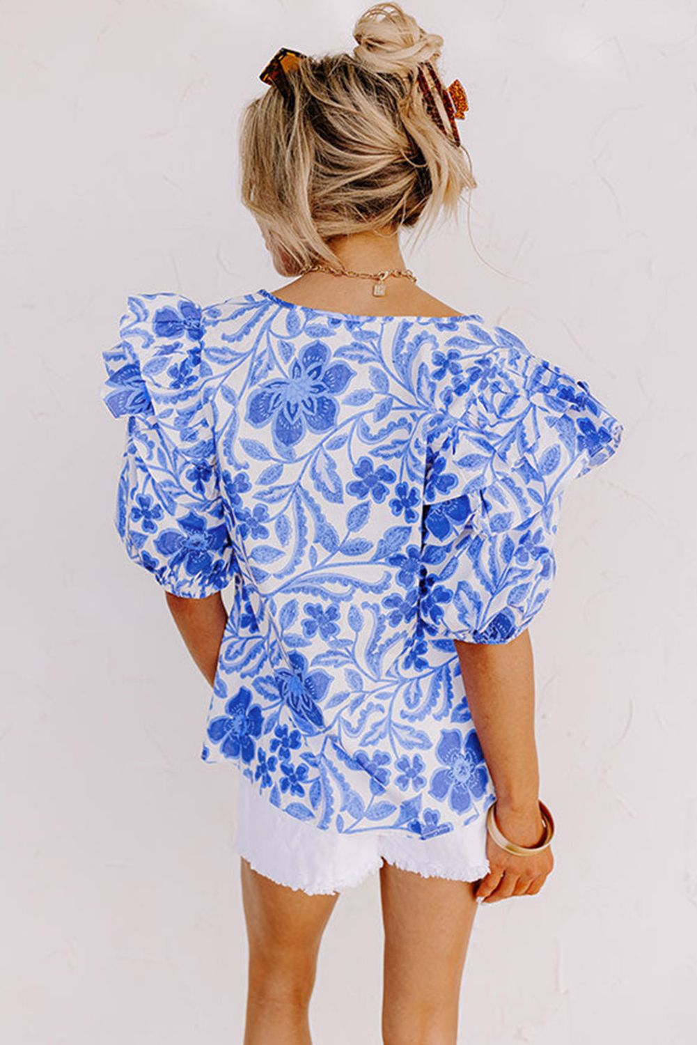 Chic Floral Blouse: Dark Blue Ruffled Bubble Sleeve Top for Women - Detail View 2 Chic Floral Blouse: Dark Blue Ruffled Bubble Sleeve Top for Women - Detail View 2