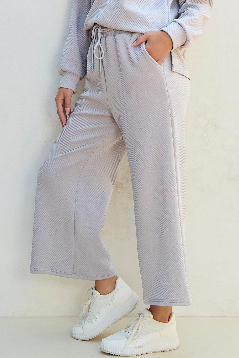 Versatile Two-Piece Set: Light Grey Textured V-Neck Top and Wide Leg Pants - Detail View 7 Versatile Two-Piece Set: Light Grey Textured V-Neck Top and Wide Leg Pants - Detail View 7