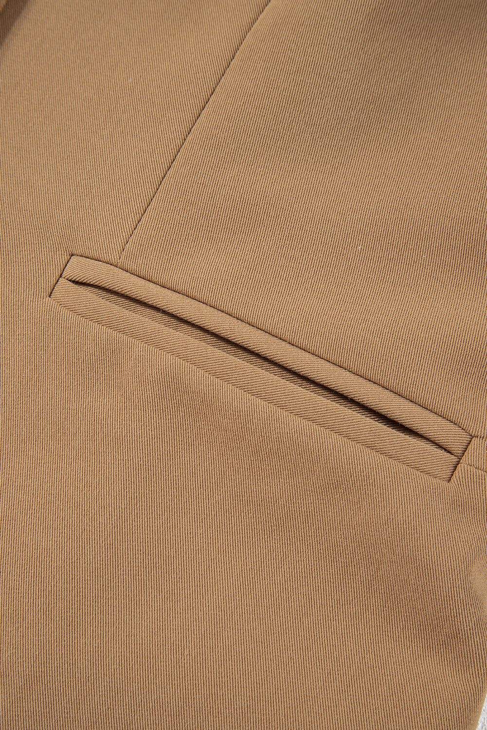Elevate your style and add a touch of sophistication with this Women's Chestnut Solid Color V Neck Suit Vest. Perfect for layering, this classic solid color vest features a timeless and versatile design that can be dressed up or down. The V neckline adds a touch of elegance to your outfit, while the button closure provides a polished and adjustable fit. With a versatile style for your wardrobe update, this vest is a must-have for your fashion collection. Made from a blend of 85% polyester, 10% viscose, and 5% elastane, this vest ensures durability and comfort. Pair it with a blouse, dress, or even a top for a chic and modern look. - Detail View 14 Elevate your style and add a touch of sophistication with this Women's Chestnut Solid Color V Neck Suit Vest. Perfect for layering, this classic solid color vest features a timeless and versatile design that can be dressed up or down. The V neckline adds a touch of elegance to your outfit, while the button closure provides a polished and adjustable fit. With a versatile style for your wardrobe update, this vest is a must-have for your fashion collection. Made from a blend of 85% polyester, 10% viscose, and 5% elastane, this vest ensures durability and comfort. Pair it with a blouse, dress, or even a top for a chic and modern look. - Detail View 14