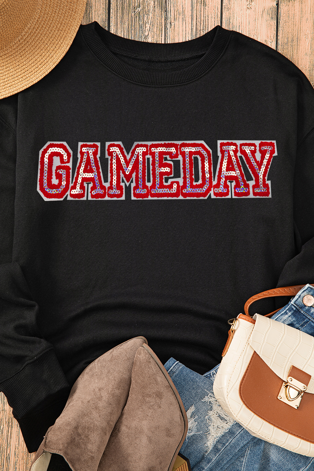 Get ready to show off your team spirit with this Women's Black Sequined Game Day Rugby Football Season Sweatshirt. The drop shoulder design creates a relaxed and laid-back silhouette, while the eye-catching sequined letter detailing adds a touch of sparkle and excitement. Perfect for the football season, this sweatshirt is a must-have for any fan. The classic crew neck design offers a comfortable and timeless neckline, and the long sleeves ensure warmth and coverage. This graphic sweatshirt is a great addition to your wardrobe, featuring delicate cuttings and attractive prices. - Detail View 9 Get ready to show off your team spirit with this Women's Black Sequined Game Day Rugby Football Season Sweatshirt. The drop shoulder design creates a relaxed and laid-back silhouette, while the eye-catching sequined letter detailing adds a touch of sparkle and excitement. Perfect for the football season, this sweatshirt is a must-have for any fan. The classic crew neck design offers a comfortable and timeless neckline, and the long sleeves ensure warmth and coverage. This graphic sweatshirt is a great addition to your wardrobe, featuring delicate cuttings and attractive prices. - Detail View 9