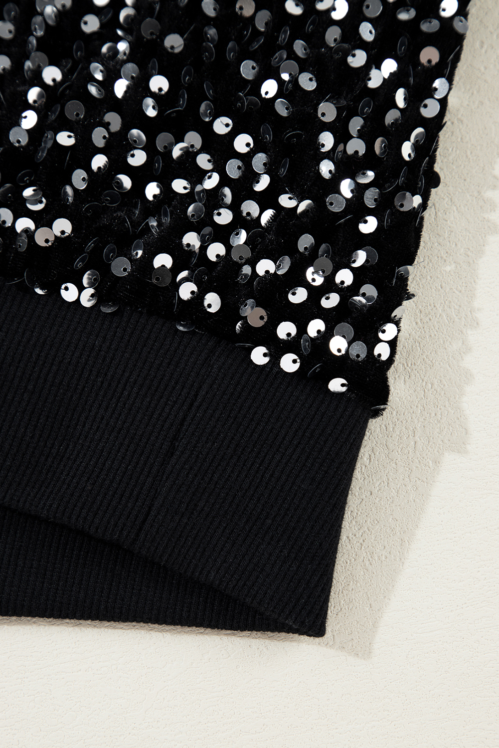 Make a statement with this stunning Women's Black Sequined Long Sleeve Crew Neck Cropped Blouse. The long sleeves and classic crew neck design provide a comfortable and timeless fit, while the trendy crop length adds a modern and chic twist to your outfit. The captivating sequins on the blouse elevate your casual look to a whole new level, perfect for night out, cocktail party or daily wear. This elegant blouse is made from premium 100% PET material, ensuring a soft and cozy fit. The combination of the black color and sequins makes it a versatile piece that can be paired with many different outfits and styles. - Detail View 14 Make a statement with this stunning Women's Black Sequined Long Sleeve Crew Neck Cropped Blouse. The long sleeves and classic crew neck design provide a comfortable and timeless fit, while the trendy crop length adds a modern and chic twist to your outfit. The captivating sequins on the blouse elevate your casual look to a whole new level, perfect for night out, cocktail party or daily wear. This elegant blouse is made from premium 100% PET material, ensuring a soft and cozy fit. The combination of the black color and sequins makes it a versatile piece that can be paired with many different outfits and styles. - Detail View 14