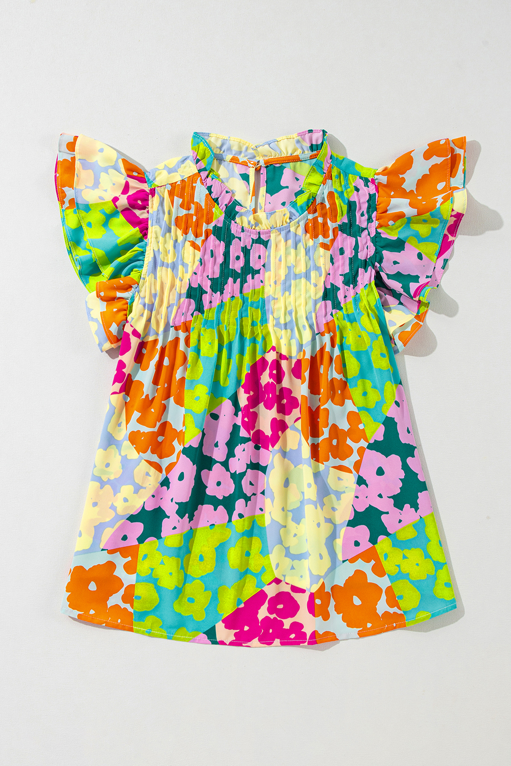 Feminine and Stylish Abstract Print Blouse with Flutter Sleeves - Detail View 2 Feminine and Stylish Abstract Print Blouse with Flutter Sleeves - Detail View 2