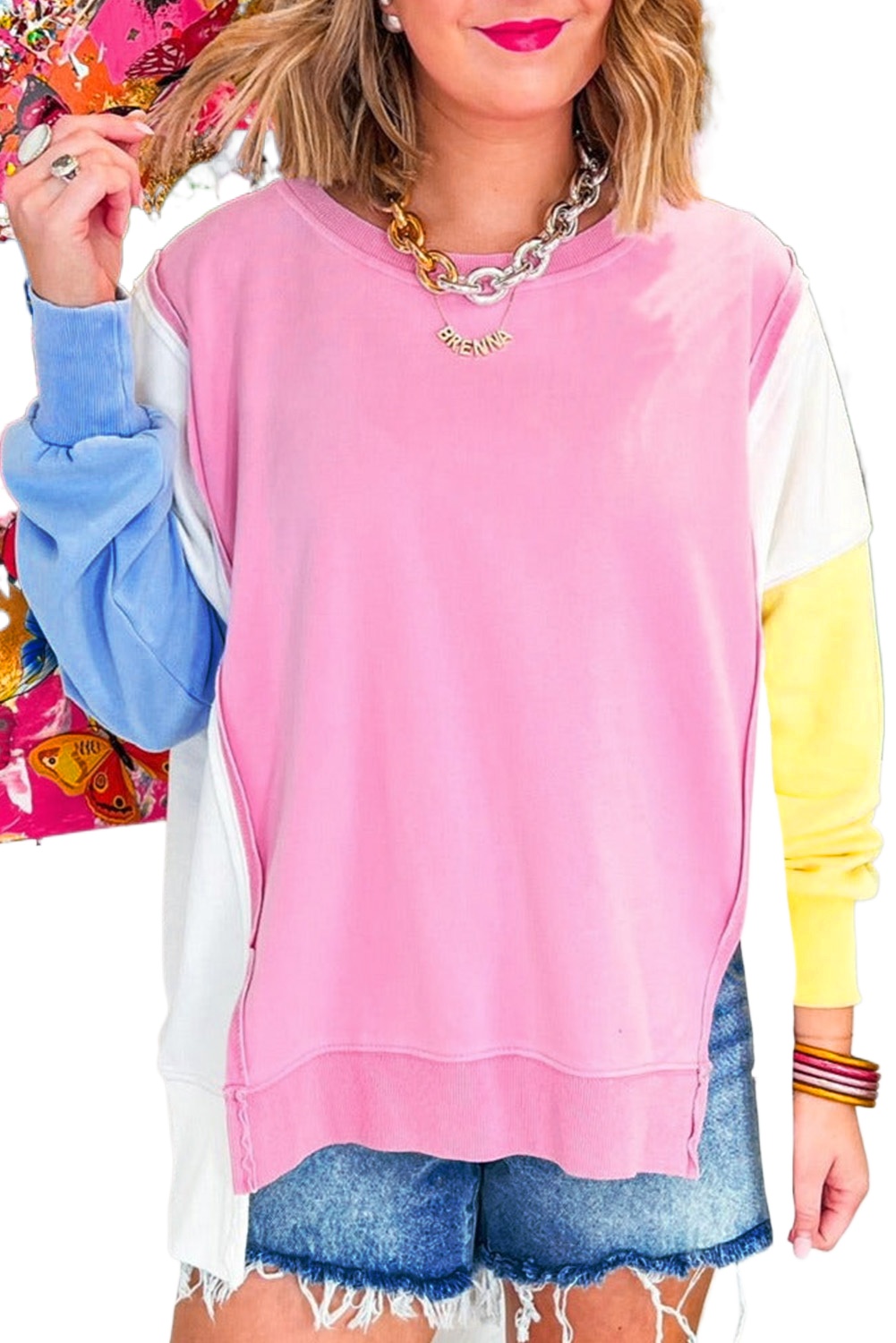 Trendy Long Sleeve Sweatshirt: Exposed Seam and Side Slits - Bonbon Color - Detail View 2 Trendy Long Sleeve Sweatshirt: Exposed Seam and Side Slits - Bonbon Color - Detail View 2
