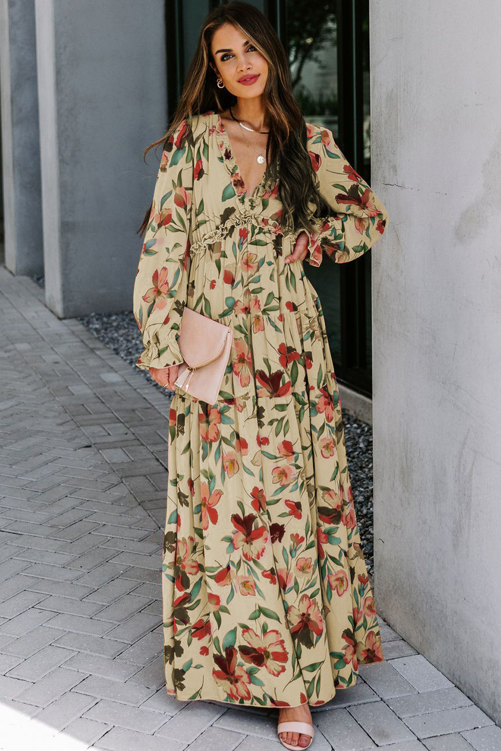 Steal the show in our Women's Wild Lotus Ruffle Tiered Maxi Dress, a stunning addition to your wardrobe. This maxi dress features a unique and eye-catching floral print, perfect for making a statement at any event. Designed with a plunging neckline, long sleeves with elastic cuffs, and an elastic waistband, this dress offers a flattering and comfortable fit. The ruffle trimming adds a touch of sweetness to the overall style, making it a must-have bohemian-inspired piece. Whether you're attending a wedding or going on a vacation, this dress is the perfect choice for a stylish and chic look. Embrace the beauty of spring and early fall with this versatile and fashionable dress. Find your next party outfit from our collection of amazing styles. - Detail View 4 Steal the show in our Women's Wild Lotus Ruffle Tiered Maxi Dress, a stunning addition to your wardrobe. This maxi dress features a unique and eye-catching floral print, perfect for making a statement at any event. Designed with a plunging neckline, long sleeves with elastic cuffs, and an elastic waistband, this dress offers a flattering and comfortable fit. The ruffle trimming adds a touch of sweetness to the overall style, making it a must-have bohemian-inspired piece. Whether you're attending a wedding or going on a vacation, this dress is the perfect choice for a stylish and chic look. Embrace the beauty of spring and early fall with this versatile and fashionable dress. Find your next party outfit from our collection of amazing styles. - Detail View 4