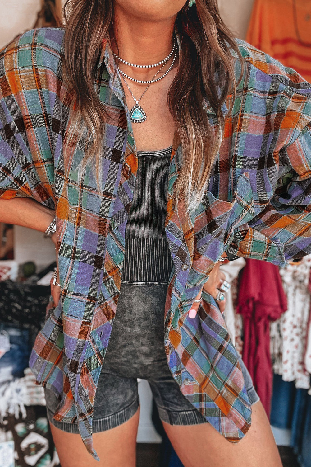 Embrace timeless style with this Women's Orange Plaid Print Loose Vintage Shirt. The classic design with a touch of retro charm exudes sophistication and elegance. The loose fit style offers comfort and is suitable for all body types, making it a versatile piece that can be styled in various ways. Made from premium 100% cotton, this shirt ensures durability and breathability. The orange plaid print adds a pop of color and interest to your outfit, perfect for the fall and autumn season. The long sleeves and button details add a touch of Western-inspired style to the shirt. Pair it with jeans and boots for a casual and chic look, or tuck it into a skirt for a more polished ensemble. This shirt is a must-have addition to your wardrobe, offering a wide selection of chic patterns for daily wear. - Detail View 4 Embrace timeless style with this Women's Orange Plaid Print Loose Vintage Shirt. The classic design with a touch of retro charm exudes sophistication and elegance. The loose fit style offers comfort and is suitable for all body types, making it a versatile piece that can be styled in various ways. Made from premium 100% cotton, this shirt ensures durability and breathability. The orange plaid print adds a pop of color and interest to your outfit, perfect for the fall and autumn season. The long sleeves and button details add a touch of Western-inspired style to the shirt. Pair it with jeans and boots for a casual and chic look, or tuck it into a skirt for a more polished ensemble. This shirt is a must-have addition to your wardrobe, offering a wide selection of chic patterns for daily wear. - Detail View 4