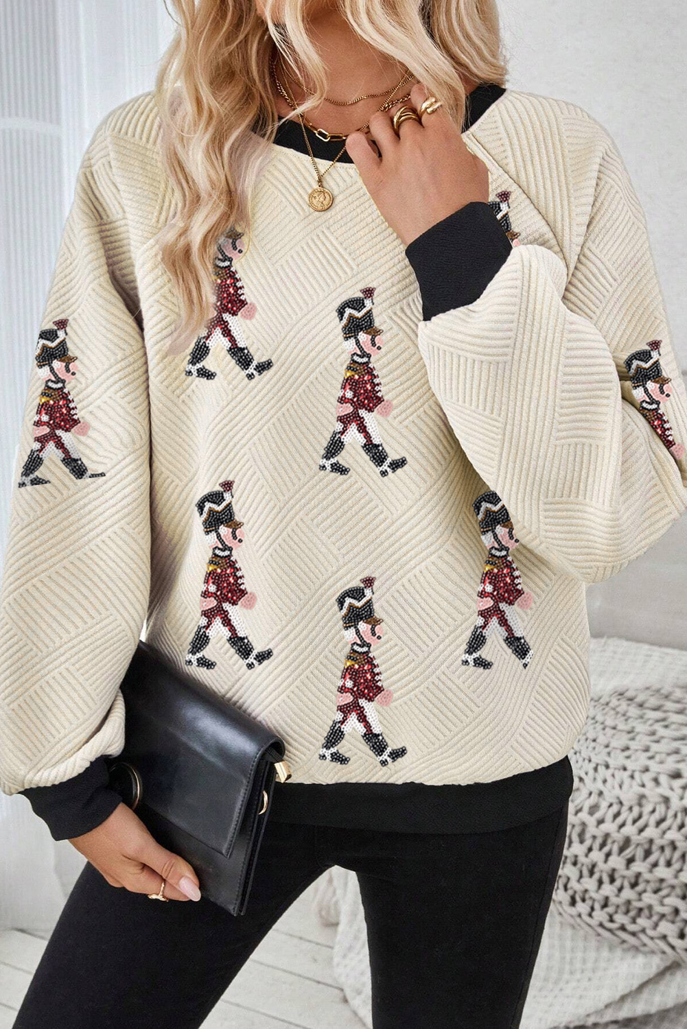 Festive Graphic Long Sleeve Tee with Shimmering Nutcracker Patches and Colorblock Design - Detail View 2 Festive Graphic Long Sleeve Tee with Shimmering Nutcracker Patches and Colorblock Design - Detail View 2