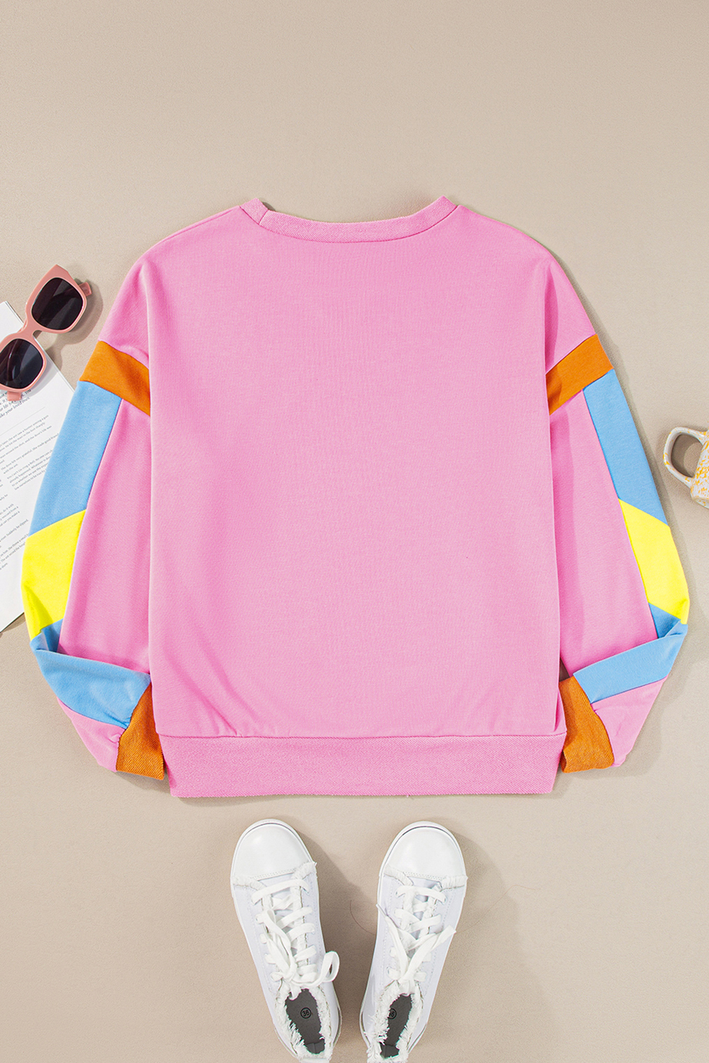Get ready for game day with this eye-catching Women's Pink Rugby Football Patchwork Color Block T-Shirt. The vibrant pink color and striking rugby football patterns make it a stylish option for sports fans. The crew neck and short sleeves provide a relaxed fit, while the colorblock design adds a fun and playful touch. Pair it with jeans or athletic wear for a sporty outfit that's ready for the big game. The graphic long sleeve tee is perfect for summertime, and the casual style makes it ideal for daily wear. - Detail View 9 Get ready for game day with this eye-catching Women's Pink Rugby Football Patchwork Color Block T-Shirt. The vibrant pink color and striking rugby football patterns make it a stylish option for sports fans. The crew neck and short sleeves provide a relaxed fit, while the colorblock design adds a fun and playful touch. Pair it with jeans or athletic wear for a sporty outfit that's ready for the big game. The graphic long sleeve tee is perfect for summertime, and the casual style makes it ideal for daily wear. - Detail View 9