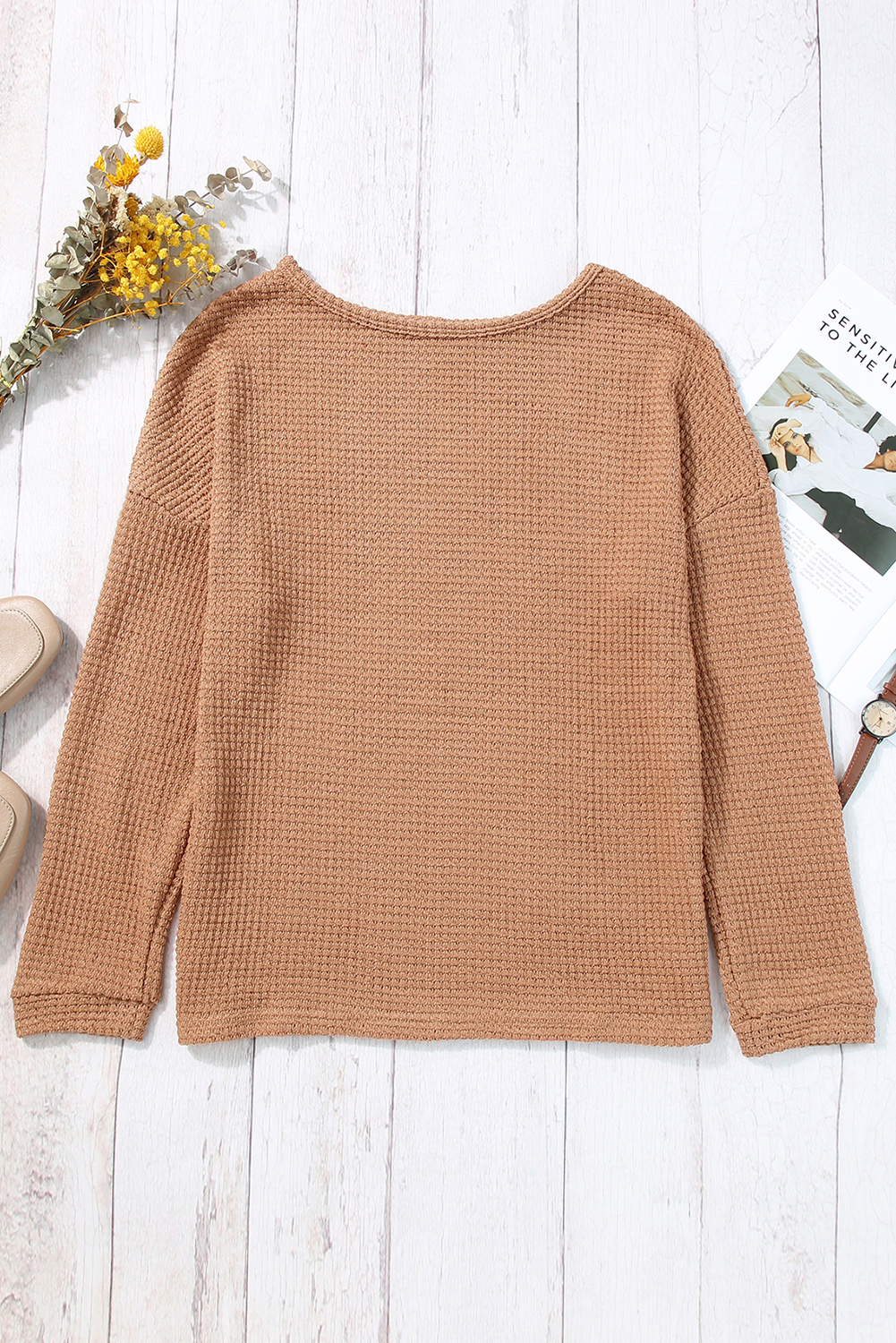 Add a touch of comfort and style to your wardrobe with this Women's Khaki Waffle Knit Drop Shoulder Long Sleeve Top. The fine material of this top ensures exceptional comfort, making it a perfect choice for daily wear. The waffle knit texture adds a high-class and fashionable element to the top, elevating your casual look. The drop shoulder design creates a slouchy and relaxed feel, adding a trendy twist to the overall style. This versatile top pairs perfectly with any bottoms, such as jeans, skirts, or joggers, making it a must-have for your winter wardrobe. The long sleeves make it suitable for all seasons except for summer, providing warmth and style. Made from a premium blend of 95% polyester and 5% elastane, this top ensures durability and a comfortable fit. Embrace the chic and casual appeal of this green long sleeve top for a stylish and effortless look. - Detail View 9 Add a touch of comfort and style to your wardrobe with this Women's Khaki Waffle Knit Drop Shoulder Long Sleeve Top. The fine material of this top ensures exceptional comfort, making it a perfect choice for daily wear. The waffle knit texture adds a high-class and fashionable element to the top, elevating your casual look. The drop shoulder design creates a slouchy and relaxed feel, adding a trendy twist to the overall style. This versatile top pairs perfectly with any bottoms, such as jeans, skirts, or joggers, making it a must-have for your winter wardrobe. The long sleeves make it suitable for all seasons except for summer, providing warmth and style. Made from a premium blend of 95% polyester and 5% elastane, this top ensures durability and a comfortable fit. Embrace the chic and casual appeal of this green long sleeve top for a stylish and effortless look. - Detail View 9