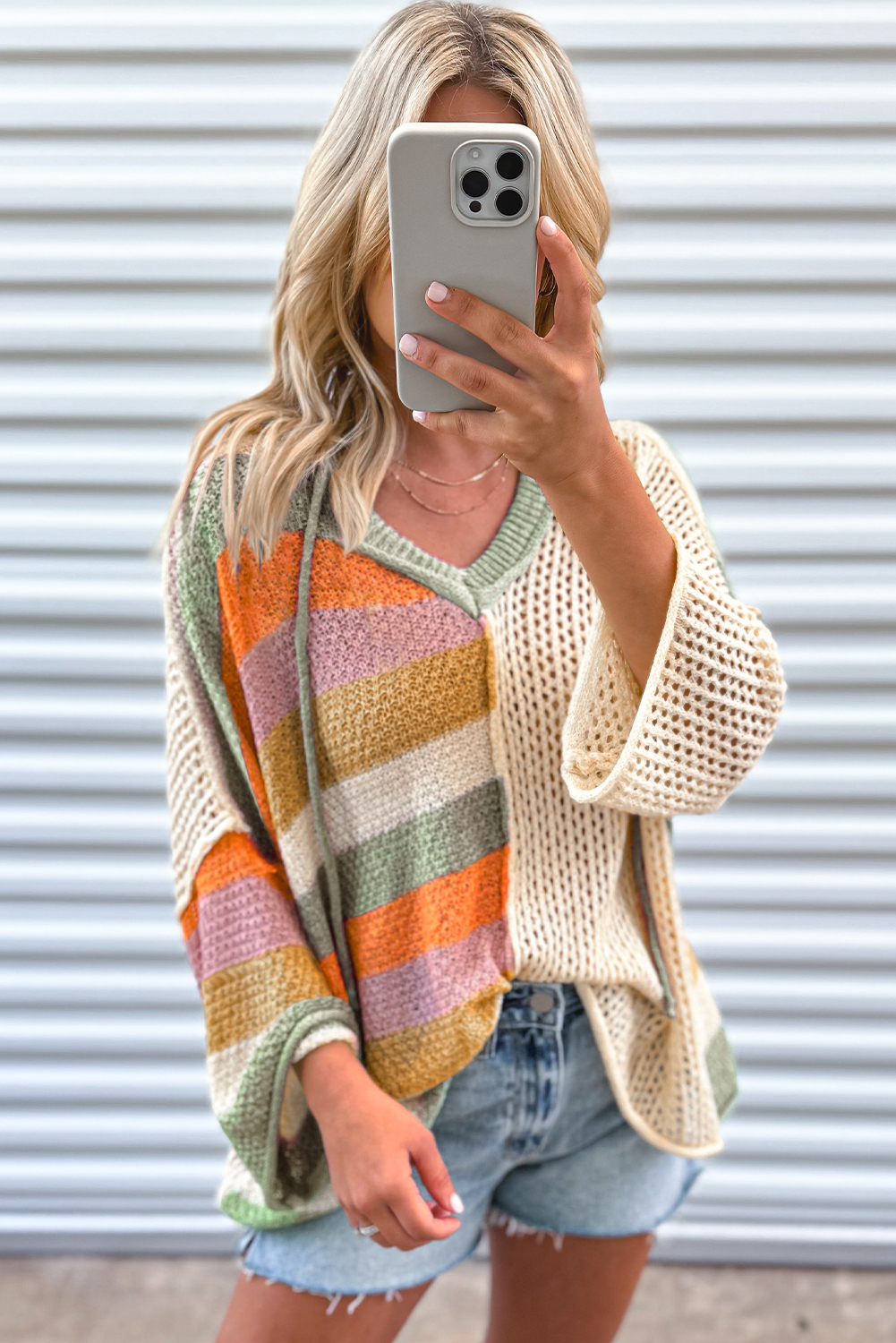 Fall in love with this Women's Beige Oversized Colorblock V-Neck Hooded Sweater, featuring an eye-catching color block and hollowed patchwork design. The relaxed fit style offers both comfort and style, making it a versatile addition to your wardrobe. The V-neck and hooded design add a trendy and faddish touch to the sweater. Made from premium 100% acrylic, this sweater is soft, warm, and perfect for the spring season. Whether it's a date, gathering, party, or daily wear, this sweater is the perfect choice. The solid beige color and color block details make it easy to pair with different bottoms for a variety of stylish looks. Embrace the cozy and chic vibe with this must-have knit sweater. - Detail View 4 Fall in love with this Women's Beige Oversized Colorblock V-Neck Hooded Sweater, featuring an eye-catching color block and hollowed patchwork design. The relaxed fit style offers both comfort and style, making it a versatile addition to your wardrobe. The V-neck and hooded design add a trendy and faddish touch to the sweater. Made from premium 100% acrylic, this sweater is soft, warm, and perfect for the spring season. Whether it's a date, gathering, party, or daily wear, this sweater is the perfect choice. The solid beige color and color block details make it easy to pair with different bottoms for a variety of stylish looks. Embrace the cozy and chic vibe with this must-have knit sweater. - Detail View 4