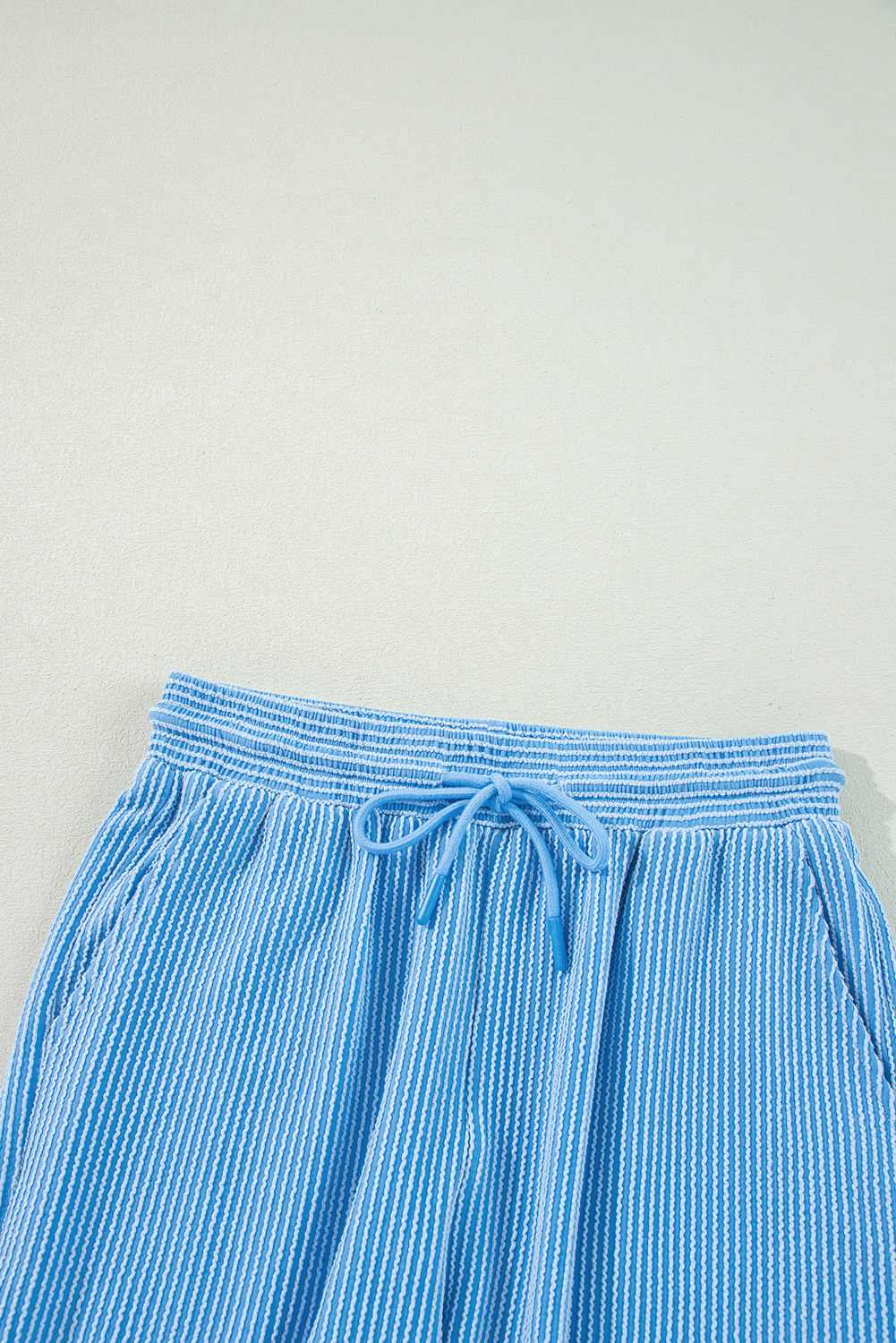 Women's Blue Solid Corded Knit Short Sleeve T-Shirt and Wide Leg Pants Set - Detail View 13 Women's Blue Solid Corded Knit Short Sleeve T-Shirt and Wide Leg Pants Set - Detail View 13