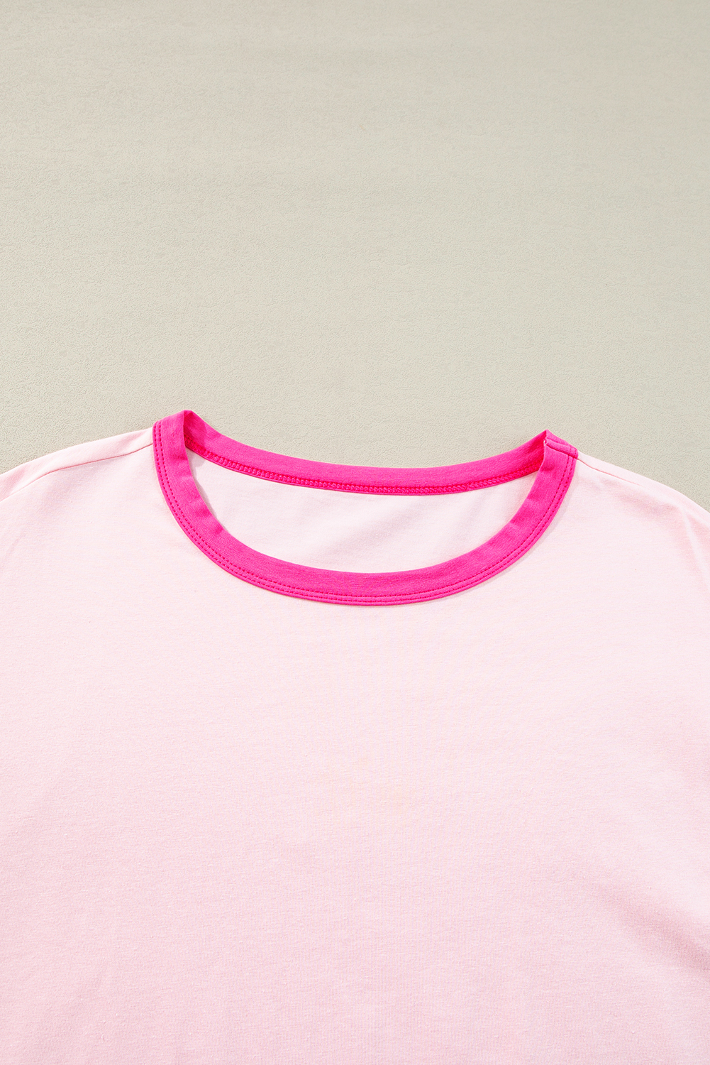 Elevate your casual look with this Women's Pink Colorblock Patchwork Long Sleeve Loose Top. The timeless and versatile crew neck design offers a classic yet modern look. The eye-catching colorblock patchwork adds a touch of uniqueness and style to the top, making it a standout piece in your wardrobe. The long sleeves provide coverage and warmth for cooler days, while the loose fit ensures a comfortable and relaxed silhouette that flatters all body types. Made from a blend of 95% cotton and 5% elastane, this top offers a soft and stretchy feel for all-day comfort. The pink color adds a feminine and trendy touch to your outfit, making it perfect for daily wear. Pair it with your favorite jeans or leggings for a chic and effortless look. This top is a must-have addition to your spring wardrobe, catering to various body types and sizes. - Detail View 4 Elevate your casual look with this Women's Pink Colorblock Patchwork Long Sleeve Loose Top. The timeless and versatile crew neck design offers a classic yet modern look. The eye-catching colorblock patchwork adds a touch of uniqueness and style to the top, making it a standout piece in your wardrobe. The long sleeves provide coverage and warmth for cooler days, while the loose fit ensures a comfortable and relaxed silhouette that flatters all body types. Made from a blend of 95% cotton and 5% elastane, this top offers a soft and stretchy feel for all-day comfort. The pink color adds a feminine and trendy touch to your outfit, making it perfect for daily wear. Pair it with your favorite jeans or leggings for a chic and effortless look. This top is a must-have addition to your spring wardrobe, catering to various body types and sizes. - Detail View 4