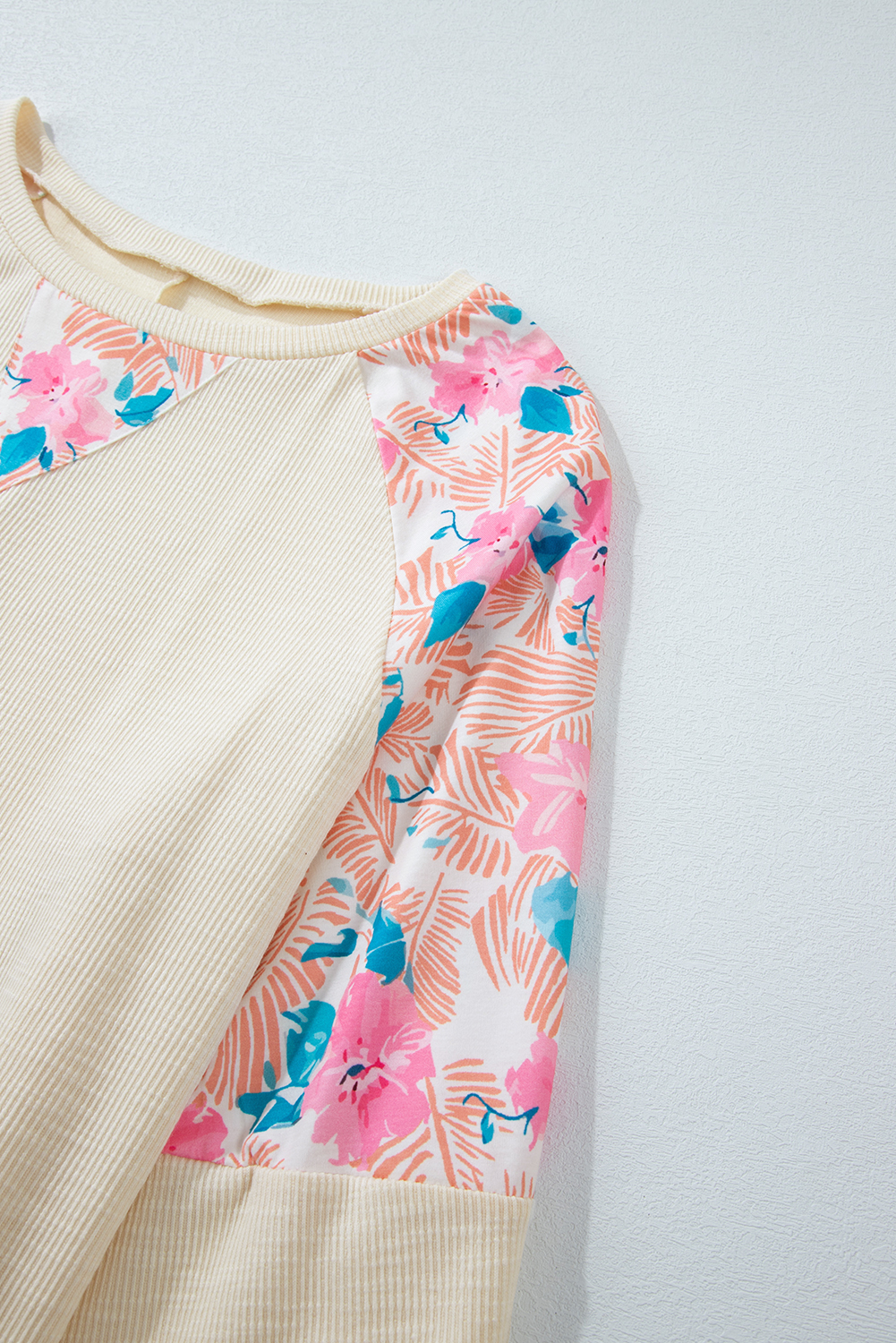 Embrace your curves with this Plus Size Floral Patchwork Ribbed Puff Sleeve Top, designed for a feminine touch. The flattering plus size fit caters to various body types and sizes, ensuring a comfortable and confident wear. The trendy puff sleeves add a stylish statement to your look, while the classic crew neck provides a timeless and versatile appeal. The textured fabric and colorful patchwork design create a bold and eye-catching look, making it perfect for daily wear. The solid apricot color adds a warm and lively touch to the outfit, suitable for fall and autumn occasions. This top is a must-have for your wardrobe, offering both comfort and style. - Detail View 14 Embrace your curves with this Plus Size Floral Patchwork Ribbed Puff Sleeve Top, designed for a feminine touch. The flattering plus size fit caters to various body types and sizes, ensuring a comfortable and confident wear. The trendy puff sleeves add a stylish statement to your look, while the classic crew neck provides a timeless and versatile appeal. The textured fabric and colorful patchwork design create a bold and eye-catching look, making it perfect for daily wear. The solid apricot color adds a warm and lively touch to the outfit, suitable for fall and autumn occasions. This top is a must-have for your wardrobe, offering both comfort and style. - Detail View 14