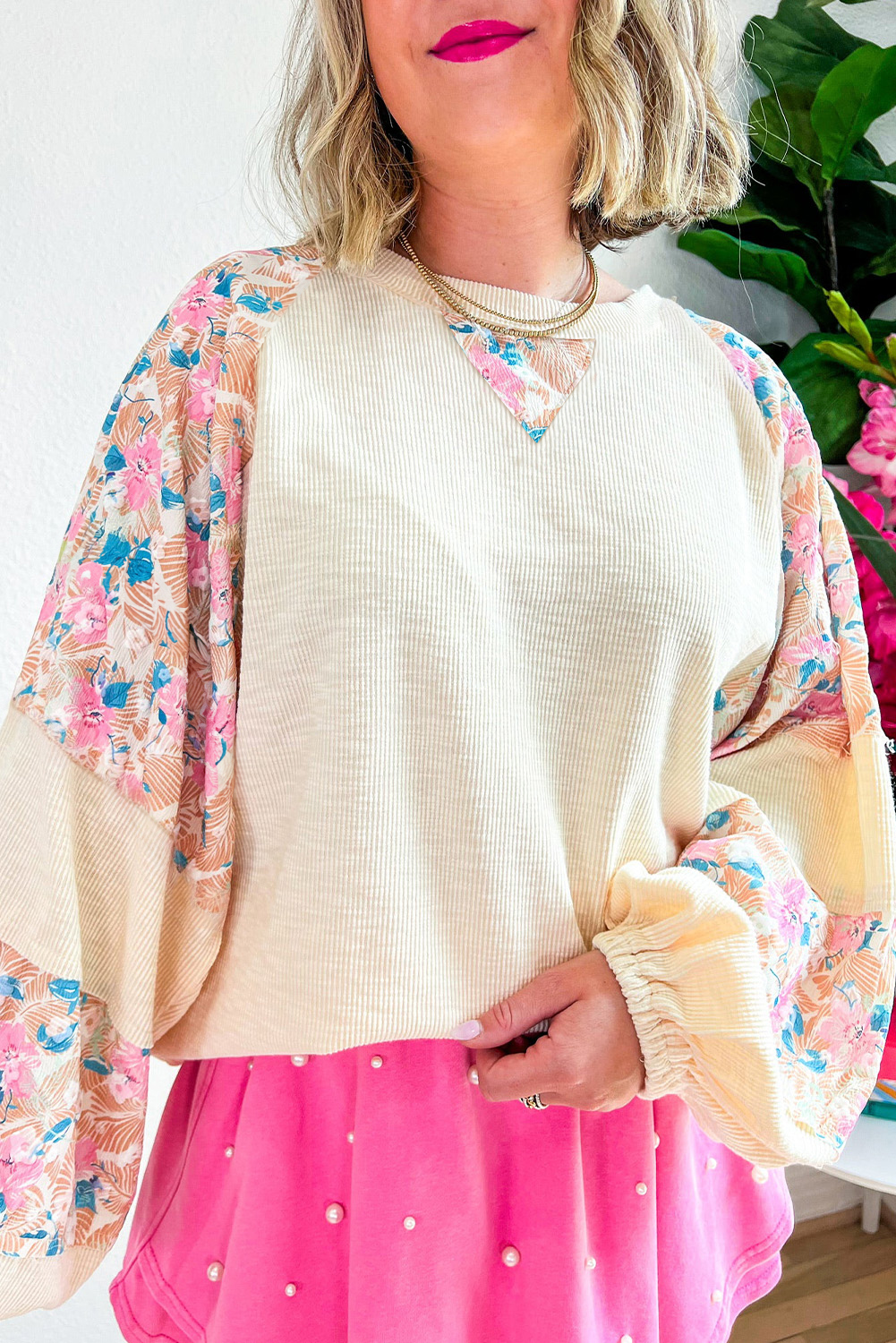 Embrace your curves with this Plus Size Floral Patchwork Ribbed Puff Sleeve Top, designed for a feminine touch. The flattering plus size fit caters to various body types and sizes, ensuring a comfortable and confident wear. The trendy puff sleeves add a stylish statement to your look, while the classic crew neck provides a timeless and versatile appeal. The textured fabric and colorful patchwork design create a bold and eye-catching look, making it perfect for daily wear. The solid apricot color adds a warm and lively touch to the outfit, suitable for fall and autumn occasions. This top is a must-have for your wardrobe, offering both comfort and style. - Detail View 4 Embrace your curves with this Plus Size Floral Patchwork Ribbed Puff Sleeve Top, designed for a feminine touch. The flattering plus size fit caters to various body types and sizes, ensuring a comfortable and confident wear. The trendy puff sleeves add a stylish statement to your look, while the classic crew neck provides a timeless and versatile appeal. The textured fabric and colorful patchwork design create a bold and eye-catching look, making it perfect for daily wear. The solid apricot color adds a warm and lively touch to the outfit, suitable for fall and autumn occasions. This top is a must-have for your wardrobe, offering both comfort and style. - Detail View 4