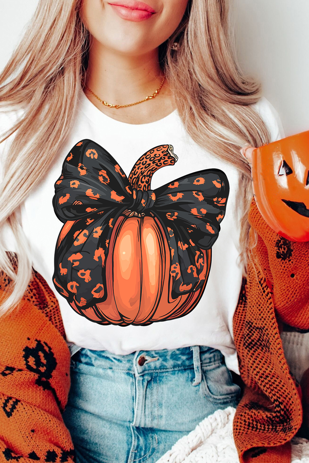 Playful Short Sleeve Tee: White Halloween Pumpkin Graphic Design - Detail View 2 Playful Short Sleeve Tee: White Halloween Pumpkin Graphic Design - Detail View 2