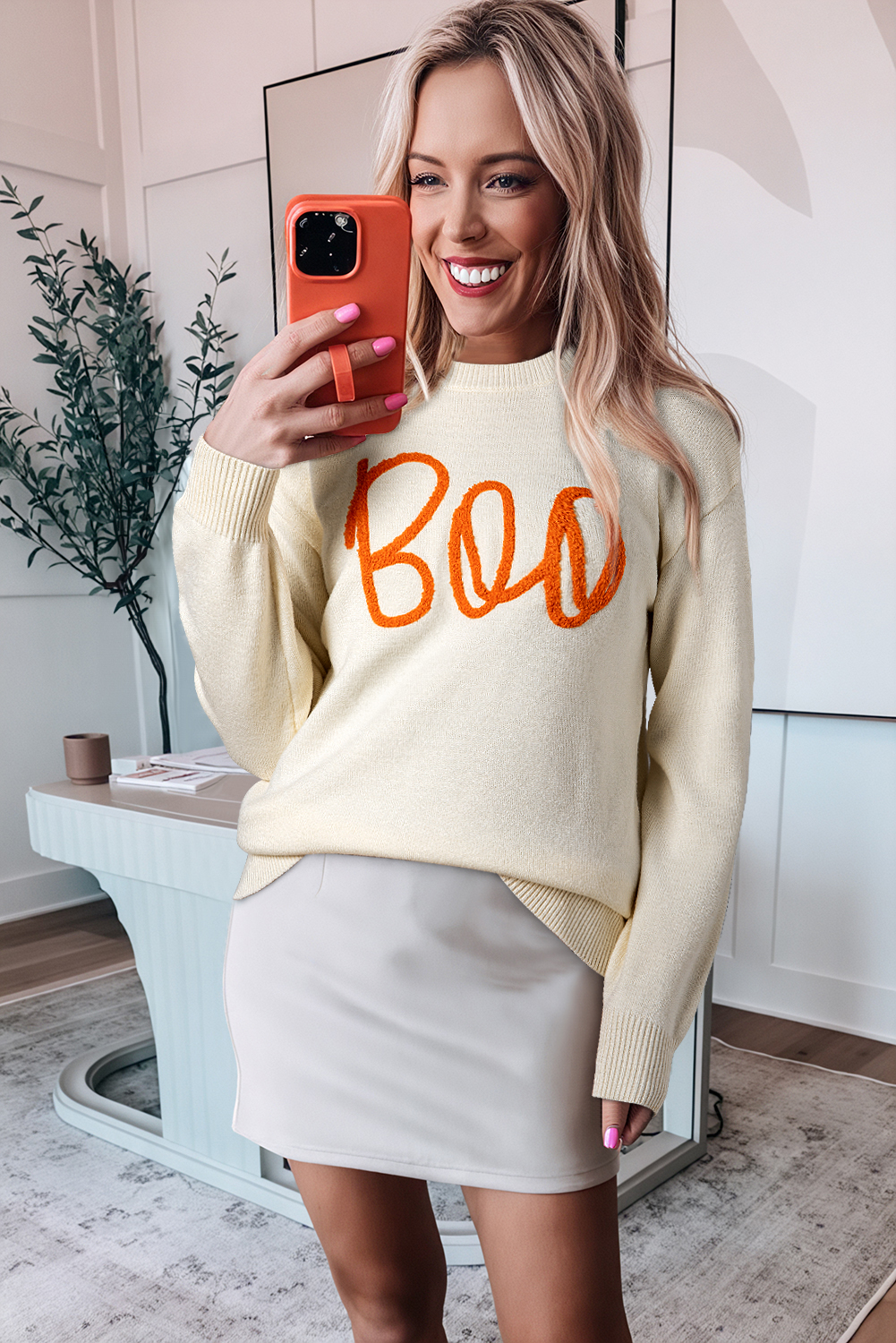Stay warm and stylish this fall with this Women's Apricot Boo Knitted Pattern Long Sleeve Drop Shoulder Sweater. The loose fit and relaxed design make it perfect for casual wear, while the playful letter pattern adds a fun and trendy touch. The ribbed edge detailing adds texture and interest to the sweater, while the classic crew neck design provides a versatile and timeless look. Made from a blend of 50% viscose, 28% polyester, and 22% polyamide, this sweater strikes the perfect balance between chic and casual. Pair it with jeans, leggings, or shorts for a cozy and effortless outfit. - Detail View 9 Stay warm and stylish this fall with this Women's Apricot Boo Knitted Pattern Long Sleeve Drop Shoulder Sweater. The loose fit and relaxed design make it perfect for casual wear, while the playful letter pattern adds a fun and trendy touch. The ribbed edge detailing adds texture and interest to the sweater, while the classic crew neck design provides a versatile and timeless look. Made from a blend of 50% viscose, 28% polyester, and 22% polyamide, this sweater strikes the perfect balance between chic and casual. Pair it with jeans, leggings, or shorts for a cozy and effortless outfit. - Detail View 9