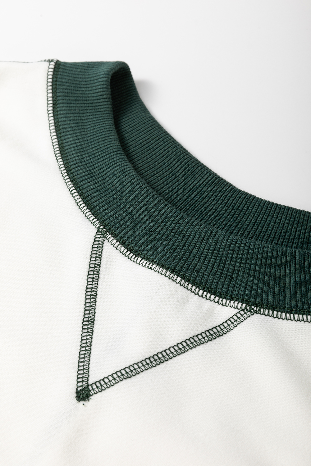 Stylish and Casual Women's Sweatshirt with Colorblock Stripes and Exposed Seams - Detail View 6 Stylish and Casual Women's Sweatshirt with Colorblock Stripes and Exposed Seams - Detail View 6