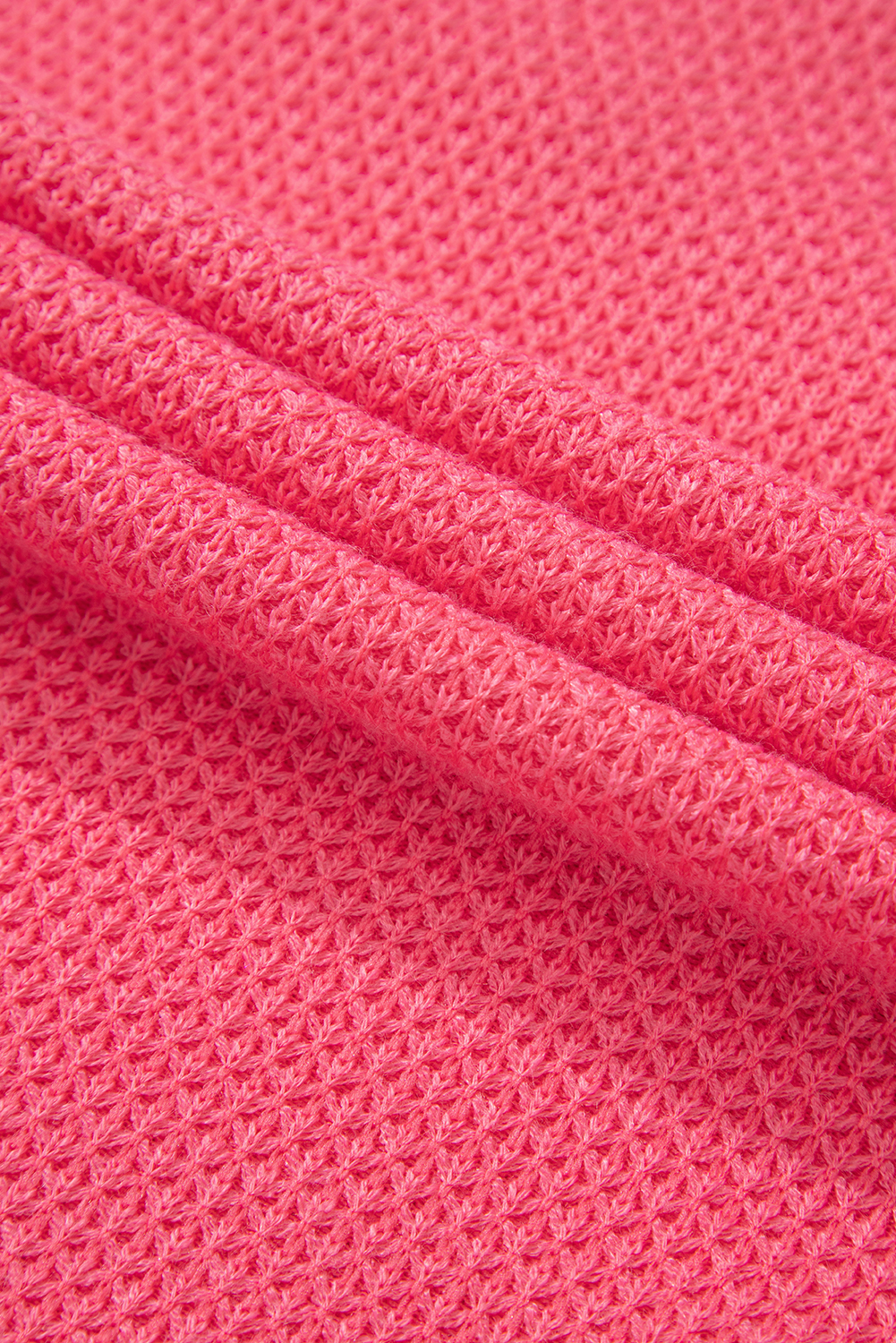 Stay warm and stylish with this Women's Peach Blossom Two Tone Waffle Knit Buttoned Shacket. The two-tone design adds a modern twist to your outfit, while the waffle knit texture provides a cozy and stylish look. The easy-to-use button closure ensures convenience, and the loose fit offers a relaxed and comfortable feel. This shacket is perfect for layering in cold weather, making it an essential addition to your fall and autumn wardrobe. Pair it with jeans and boots for a chic and effortless look. Made from a soft and durable blend of 90% polyester, 7% acrylic, and 3% elastane, this shacket ensures both comfort and long-lasting wear. - Detail View 14 Stay warm and stylish with this Women's Peach Blossom Two Tone Waffle Knit Buttoned Shacket. The two-tone design adds a modern twist to your outfit, while the waffle knit texture provides a cozy and stylish look. The easy-to-use button closure ensures convenience, and the loose fit offers a relaxed and comfortable feel. This shacket is perfect for layering in cold weather, making it an essential addition to your fall and autumn wardrobe. Pair it with jeans and boots for a chic and effortless look. Made from a soft and durable blend of 90% polyester, 7% acrylic, and 3% elastane, this shacket ensures both comfort and long-lasting wear. - Detail View 14