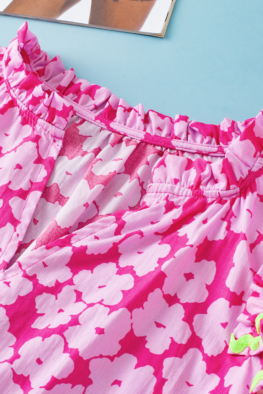 Stylish Short Sleeve Blouse: Pink Floral Print with Tiered Ruffle Detail - Detail View 12 Stylish Short Sleeve Blouse: Pink Floral Print with Tiered Ruffle Detail - Detail View 12