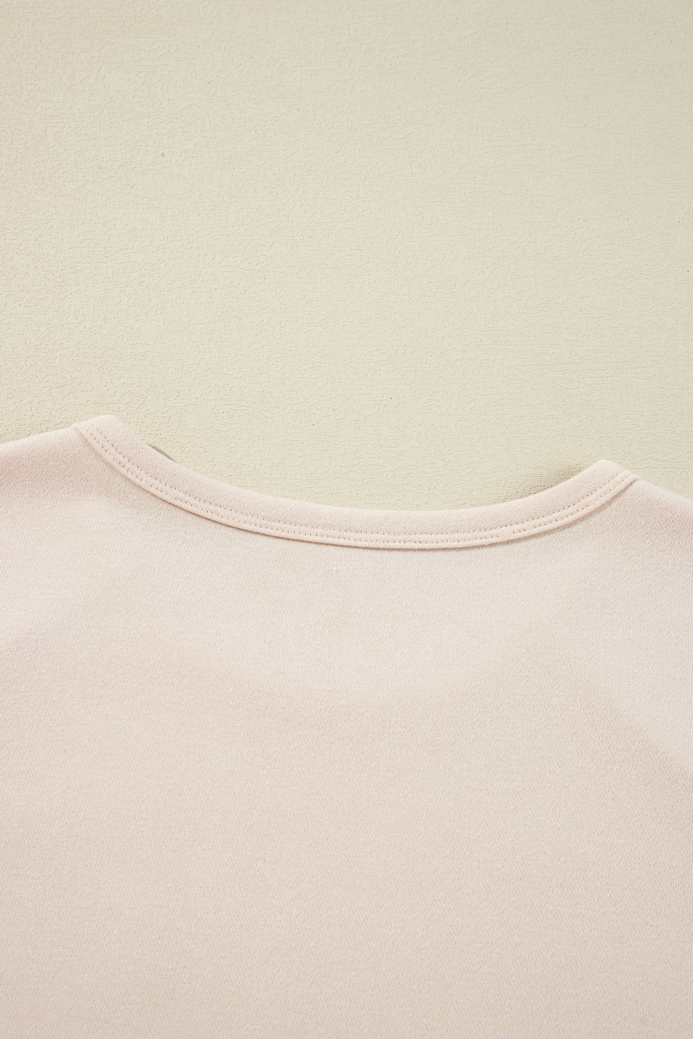 Elevate your personal style with this Women's Beige Flower Patch Graphic Exposed Seam Wide Sleeve Top. The loose and comfortable fit makes it perfect for daily wear, while the wide sleeves add a trendy and relaxed touch. The beautiful flower graphic on the front is a stylish addition, adding a pop of color to your outfit. The exposed seam detail adds an edgy touch, giving this top a unique and fashion-forward look. Made from a comfortable blend of 65% polyester and 35% cotton, this top is perfect for casual spring and summer wear. Pair it with your favorite distressed denim jeans for a chic and effortless outfit. - Detail View 9 Elevate your personal style with this Women's Beige Flower Patch Graphic Exposed Seam Wide Sleeve Top. The loose and comfortable fit makes it perfect for daily wear, while the wide sleeves add a trendy and relaxed touch. The beautiful flower graphic on the front is a stylish addition, adding a pop of color to your outfit. The exposed seam detail adds an edgy touch, giving this top a unique and fashion-forward look. Made from a comfortable blend of 65% polyester and 35% cotton, this top is perfect for casual spring and summer wear. Pair it with your favorite distressed denim jeans for a chic and effortless outfit. - Detail View 9