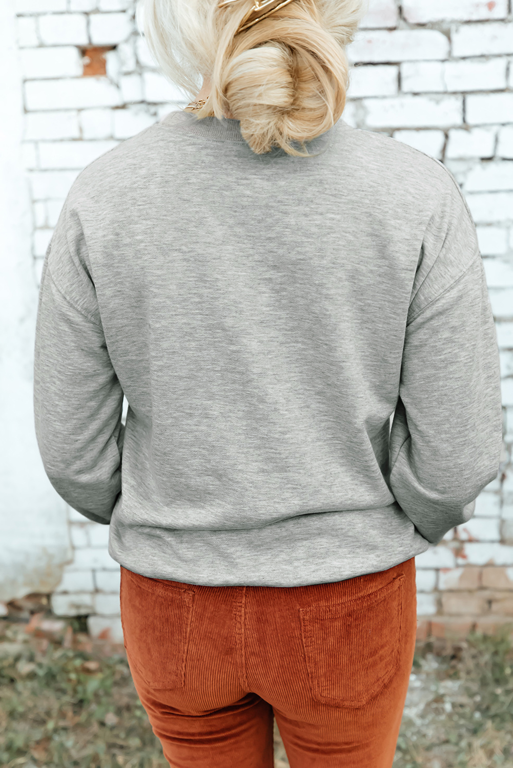 Add a touch of festive flair to your wardrobe with this Women's Gray Disco Ball Bowknot Pumpkin Graphic Crewneck Sweatshirt. The playful and fun pumpkin graphics on the front of the sweatshirt make it a perfect item for the Thanksgiving season. The crewneck design and shift fit ensure a comfortable and casual fit, making it suitable for everyday outings. Pair it with your favorite jeans or leggings for a stylish and comfortable outfit. This sweatshirt is a must-have for the cooler autumn months, and its graphic design makes it a great conversation starter. Experience the warmth and comfort of cotton and polyester blend for a stylish and cozy addition to your wardrobe. - Detail View 4 Add a touch of festive flair to your wardrobe with this Women's Gray Disco Ball Bowknot Pumpkin Graphic Crewneck Sweatshirt. The playful and fun pumpkin graphics on the front of the sweatshirt make it a perfect item for the Thanksgiving season. The crewneck design and shift fit ensure a comfortable and casual fit, making it suitable for everyday outings. Pair it with your favorite jeans or leggings for a stylish and comfortable outfit. This sweatshirt is a must-have for the cooler autumn months, and its graphic design makes it a great conversation starter. Experience the warmth and comfort of cotton and polyester blend for a stylish and cozy addition to your wardrobe. - Detail View 4