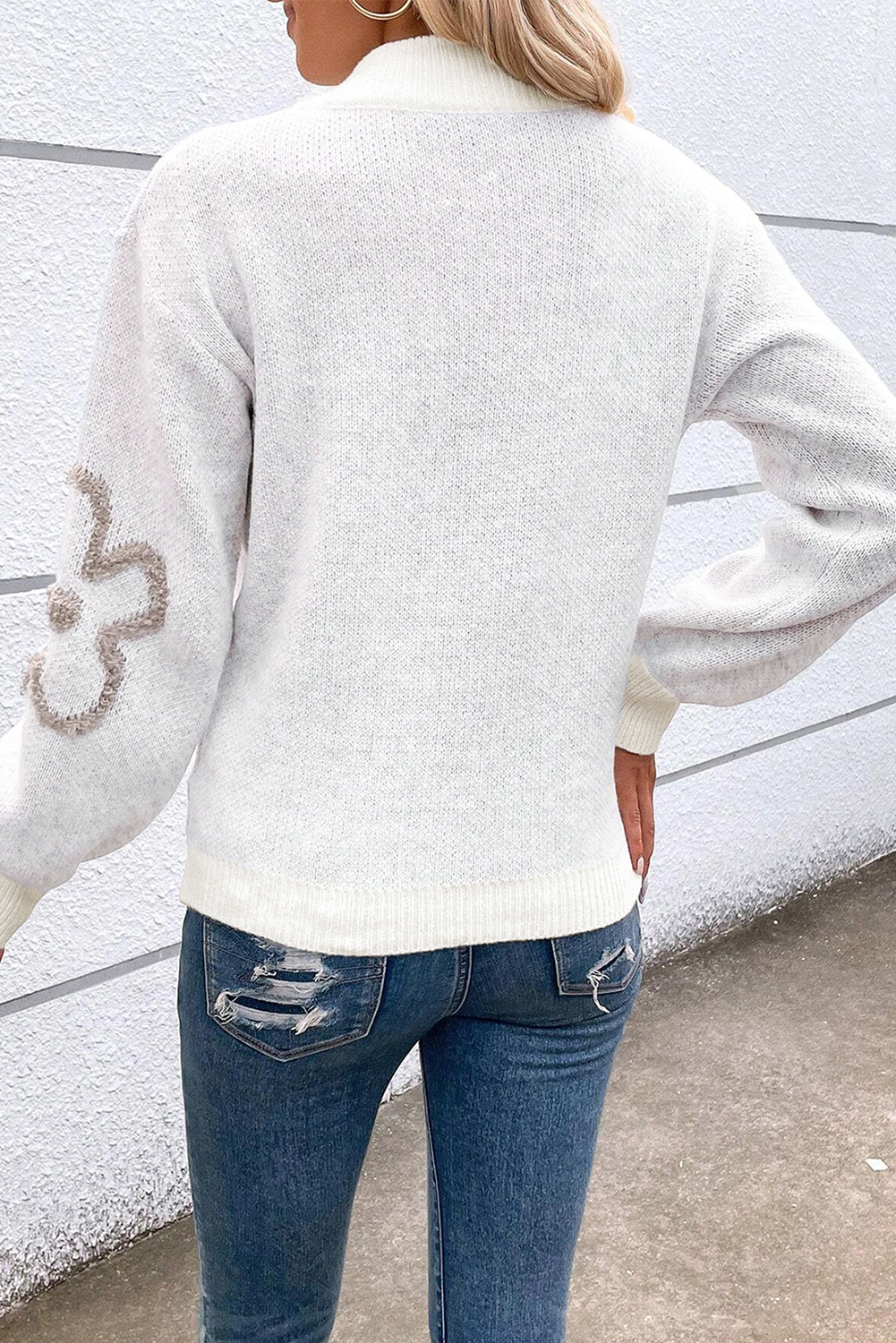 Combine Style and Comfort with this White Contrast Flower Long Sleeve Sweater - Detail View 3 Combine Style and Comfort with this White Contrast Flower Long Sleeve Sweater - Detail View 3