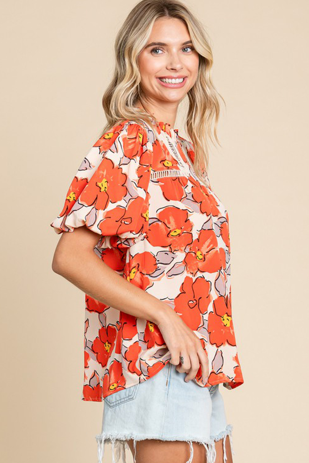 Exude femininity and grace with this Women's Orange Floral Bubble Sleeve Frill Neck Loose Blouse. The charming flower allover design adds a touch of elegance to the blouse, while the frilled neck exudes grace and modesty. The hollow out trim adds a subtle and charming touch, creating a unique and stylish look. Made from high-quality 100% polyester, this blouse drapes beautifully on the body and flatters any figure. The loose and flowy silhouette offers comfort and style, making it an ideal choice for daily wear during the summer season. The short bubble sleeves with a puff sleeve design add a trendy and chic element to the blouse. Whether for a casual outing or a special occasion, this blouse is sure to turn heads and make a statement. Pair it with your favorite bottoms for an effortlessly stylish ensemble. - Detail View 4 Exude femininity and grace with this Women's Orange Floral Bubble Sleeve Frill Neck Loose Blouse. The charming flower allover design adds a touch of elegance to the blouse, while the frilled neck exudes grace and modesty. The hollow out trim adds a subtle and charming touch, creating a unique and stylish look. Made from high-quality 100% polyester, this blouse drapes beautifully on the body and flatters any figure. The loose and flowy silhouette offers comfort and style, making it an ideal choice for daily wear during the summer season. The short bubble sleeves with a puff sleeve design add a trendy and chic element to the blouse. Whether for a casual outing or a special occasion, this blouse is sure to turn heads and make a statement. Pair it with your favorite bottoms for an effortlessly stylish ensemble. - Detail View 4