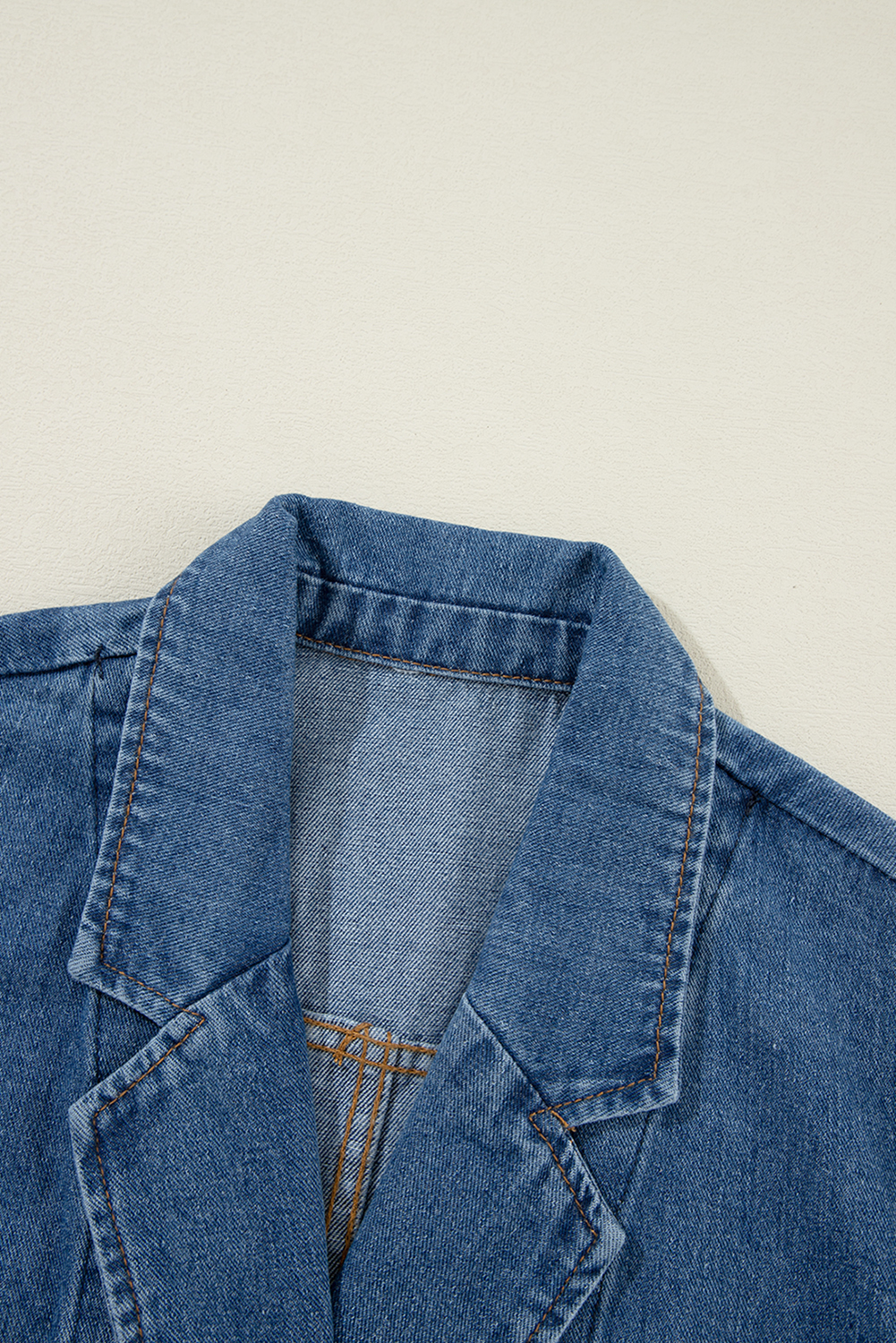 Elevate your casual looks with this Women's Chic Sail Blue Denim Jacket. The classic lapel collar adds a touch of sophistication to the jacket, making it a versatile and timeless addition to your wardrobe. The functional side pockets not only add a stylish element but also provide practicality for storing essentials. Made from durable denim fabric, this jacket ensures long-term wear and offers both comfort and style. The sail blue color adds a pop of freshness, making it perfect for the fall and autumn seasons. This solid color denim jacket is a bestseller and widely popular among ladies of all ages. Whether you're running errands or going for a casual outing, this jacket is the perfect choice for various occasions. - Detail View 9 Elevate your casual looks with this Women's Chic Sail Blue Denim Jacket. The classic lapel collar adds a touch of sophistication to the jacket, making it a versatile and timeless addition to your wardrobe. The functional side pockets not only add a stylish element but also provide practicality for storing essentials. Made from durable denim fabric, this jacket ensures long-term wear and offers both comfort and style. The sail blue color adds a pop of freshness, making it perfect for the fall and autumn seasons. This solid color denim jacket is a bestseller and widely popular among ladies of all ages. Whether you're running errands or going for a casual outing, this jacket is the perfect choice for various occasions. - Detail View 9