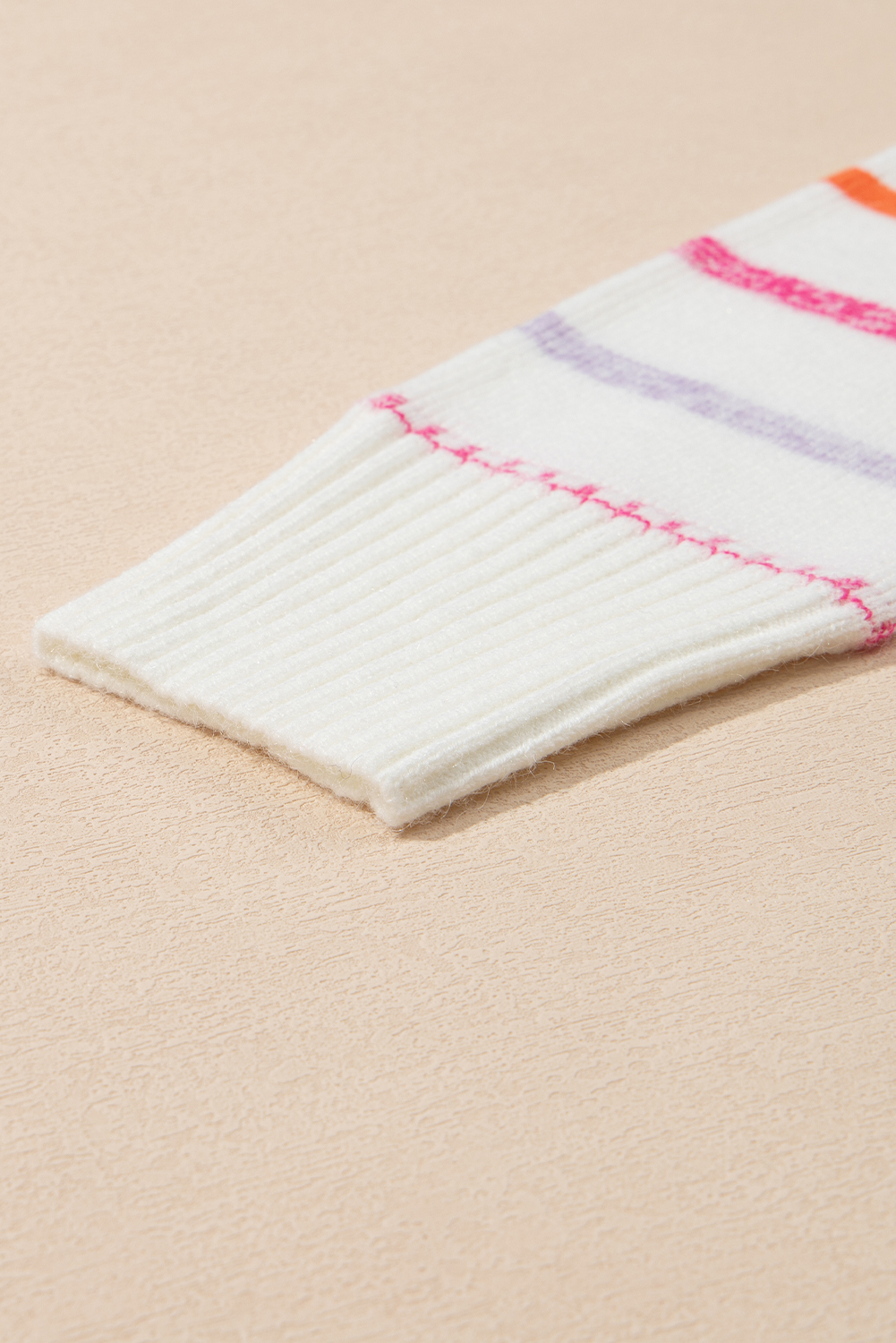 Add a playful and chic touch to your wardrobe with this Women's White Colorful Striped Ribbed Trim Sweater. The sweater features colorful stripes that add a playful and stylish element to your outfit, while the chic ribbed trim elevates the overall look. Luxuriously knitted from a blend of 42% acrylic, 30% polyester, and 28% polyamide, this sweater provides warmth and comfort, making it perfect for both casual and formal occasions. The classic round neck and long sleeves offer a timeless and versatile silhouette. This casual-style sweater is a must-have addition to your winter wardrobe, offering various styles to update your look and keep you fashionable and cozy. - Detail View 19 Add a playful and chic touch to your wardrobe with this Women's White Colorful Striped Ribbed Trim Sweater. The sweater features colorful stripes that add a playful and stylish element to your outfit, while the chic ribbed trim elevates the overall look. Luxuriously knitted from a blend of 42% acrylic, 30% polyester, and 28% polyamide, this sweater provides warmth and comfort, making it perfect for both casual and formal occasions. The classic round neck and long sleeves offer a timeless and versatile silhouette. This casual-style sweater is a must-have addition to your winter wardrobe, offering various styles to update your look and keep you fashionable and cozy. - Detail View 19
