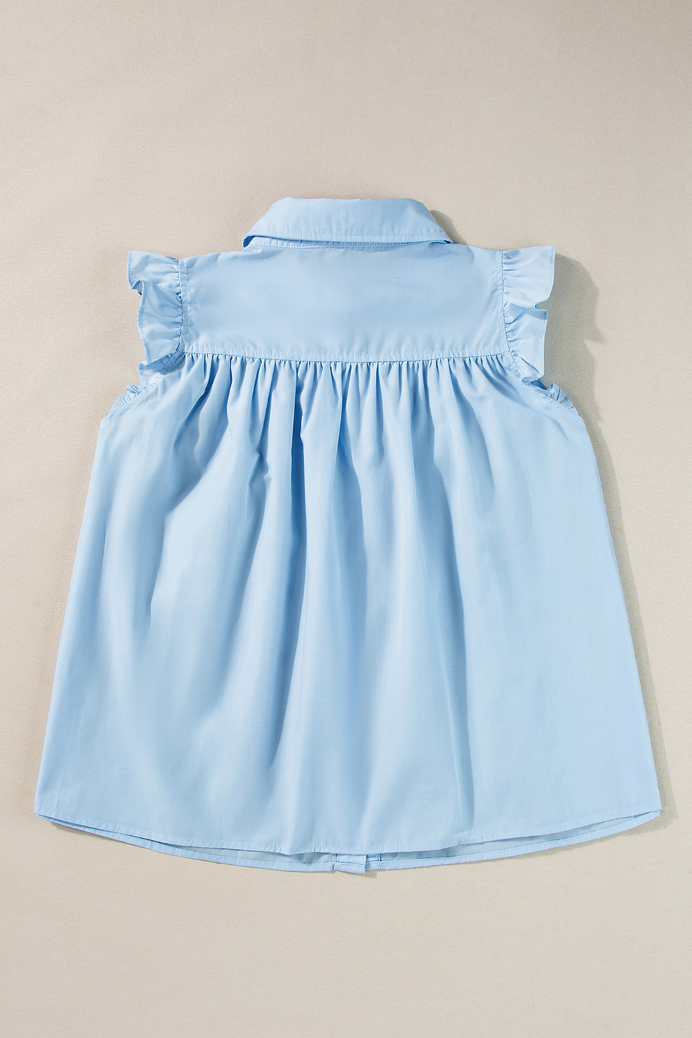 Timeless Fashion: Sky Blue Frilly Sleeveless Shirt with Classic Spread Collar - Detail View 8 Timeless Fashion: Sky Blue Frilly Sleeveless Shirt with Classic Spread Collar - Detail View 8
