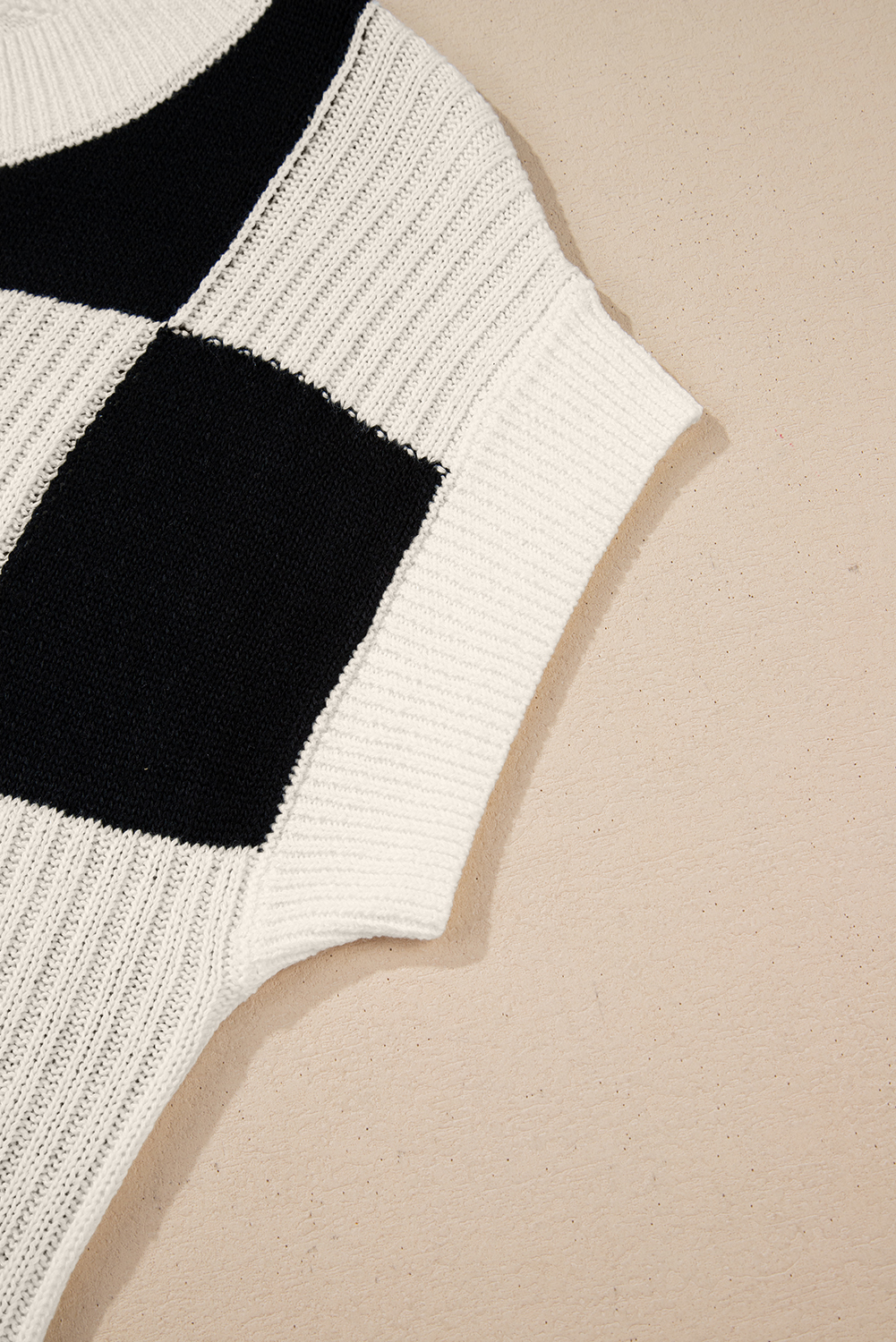 Chic Casual Black Sweater: Checkered Color Block Design with Short Sleeves - Detail View 10 Chic Casual Black Sweater: Checkered Color Block Design with Short Sleeves - Detail View 10