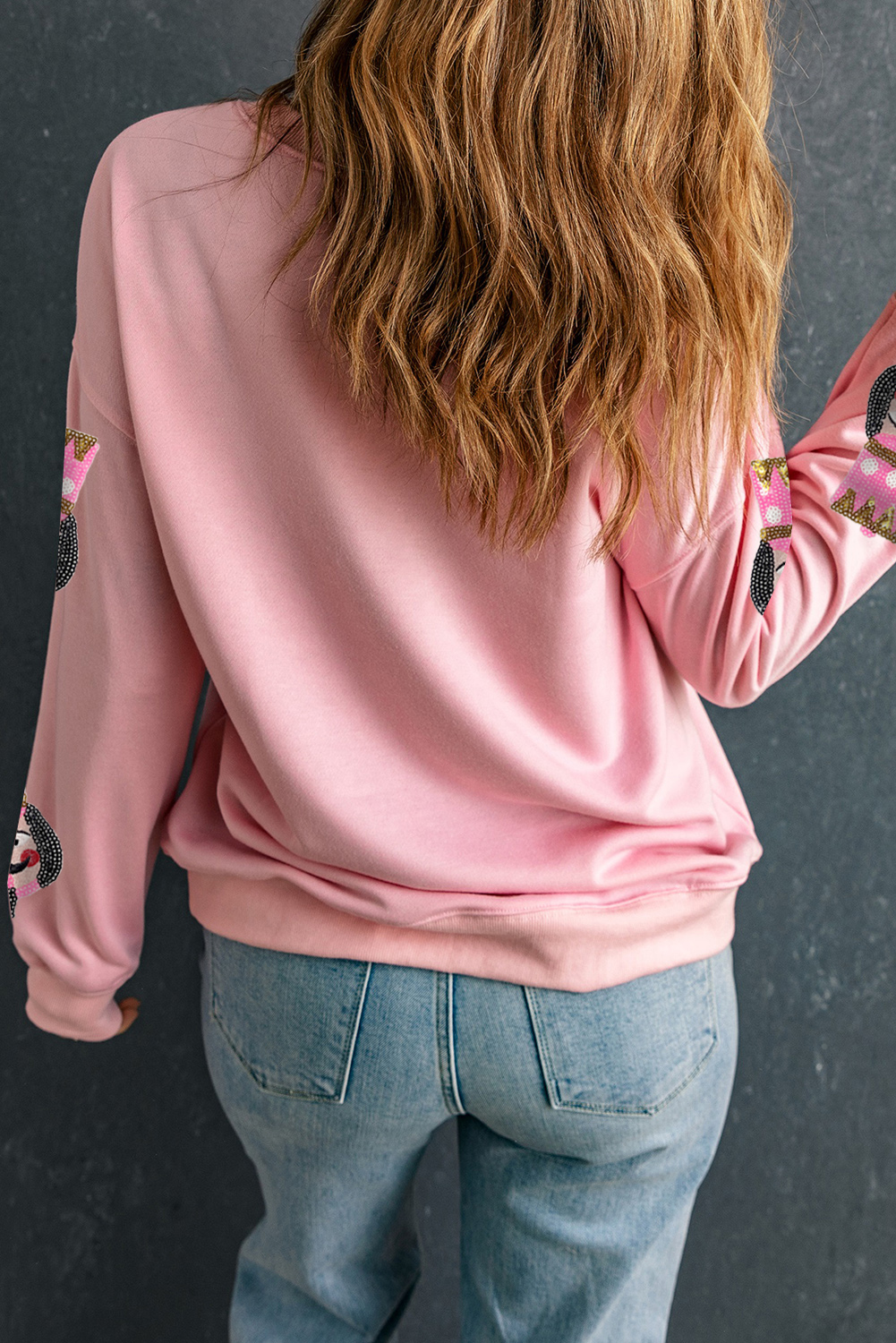 Festive Christmas Sweatshirt with Sequin Nutcracker Design - Cozy Drop Shoulder Style - Detail View 2 Festive Christmas Sweatshirt with Sequin Nutcracker Design - Cozy Drop Shoulder Style - Detail View 2