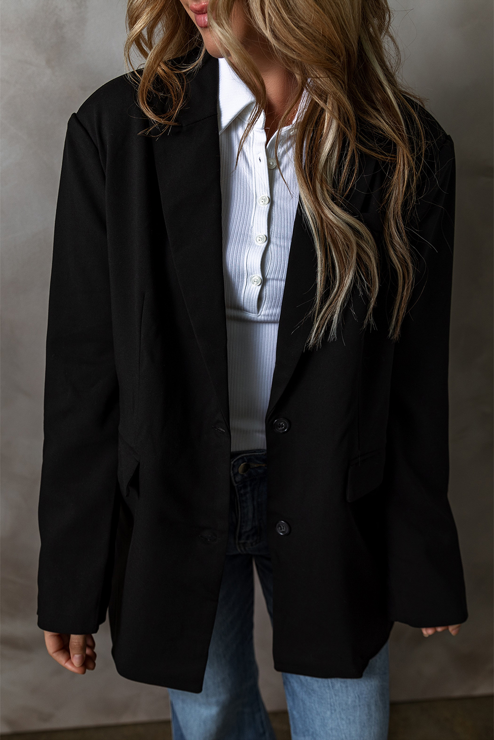 Classic Black Blazer with Lapel Collar and Functional Flap Pockets - Detail View 2 Classic Black Blazer with Lapel Collar and Functional Flap Pockets - Detail View 2