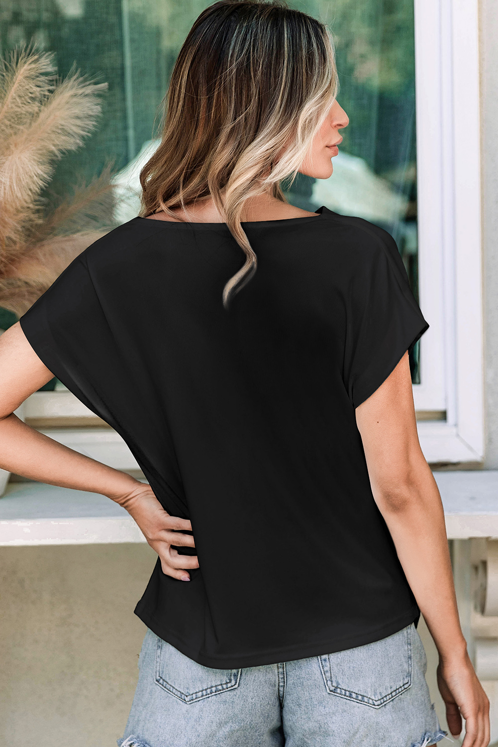 Stylish and Cozy: Fine Fabric Black T-Shirt with Cowl Neck and Bat Sleeve - Detail View 3 Stylish and Cozy: Fine Fabric Black T-Shirt with Cowl Neck and Bat Sleeve - Detail View 3