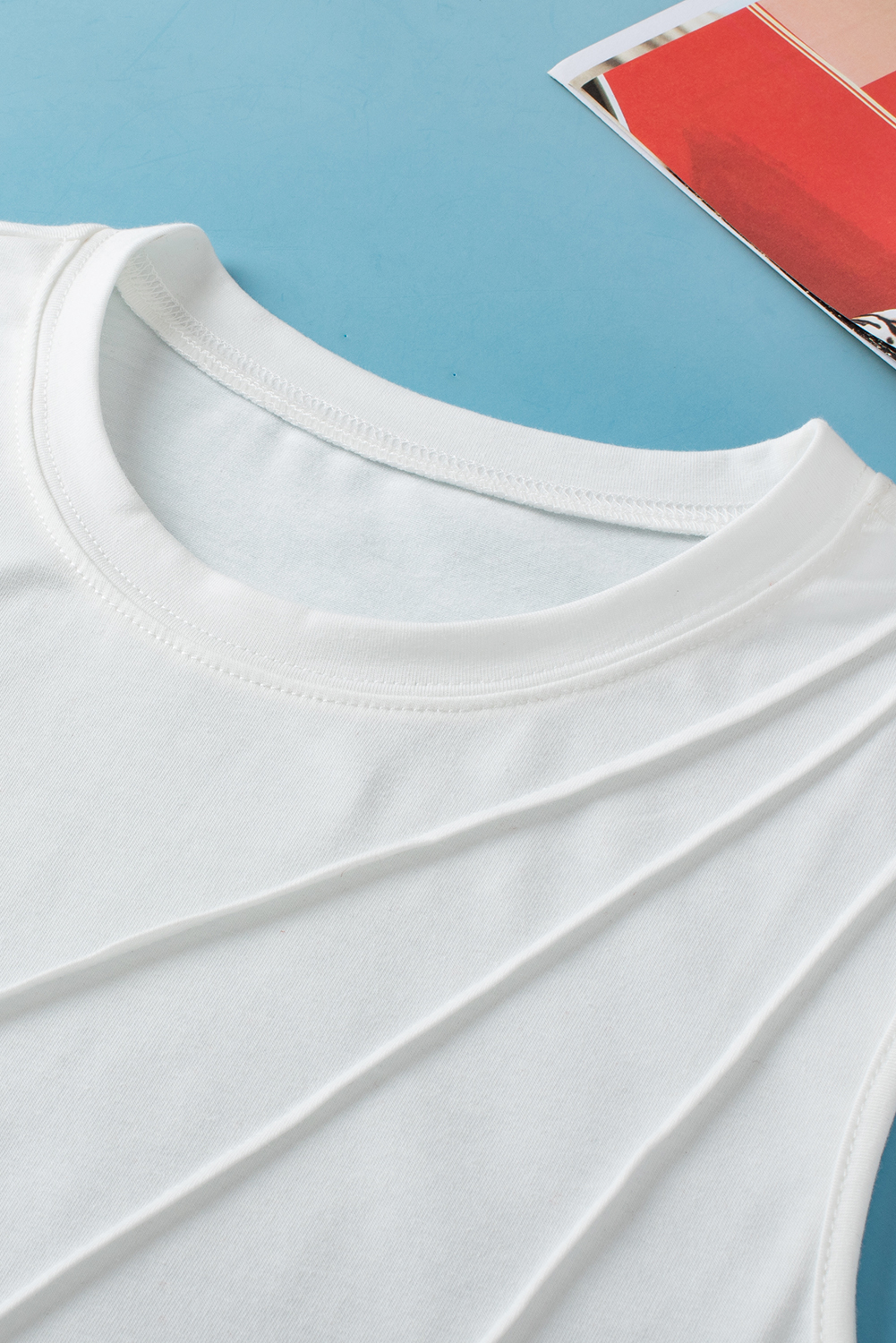 Versatile Sleeveless Top: White Crew Neck Tank with Soft Fabric - Detail View 8 Versatile Sleeveless Top: White Crew Neck Tank with Soft Fabric - Detail View 8