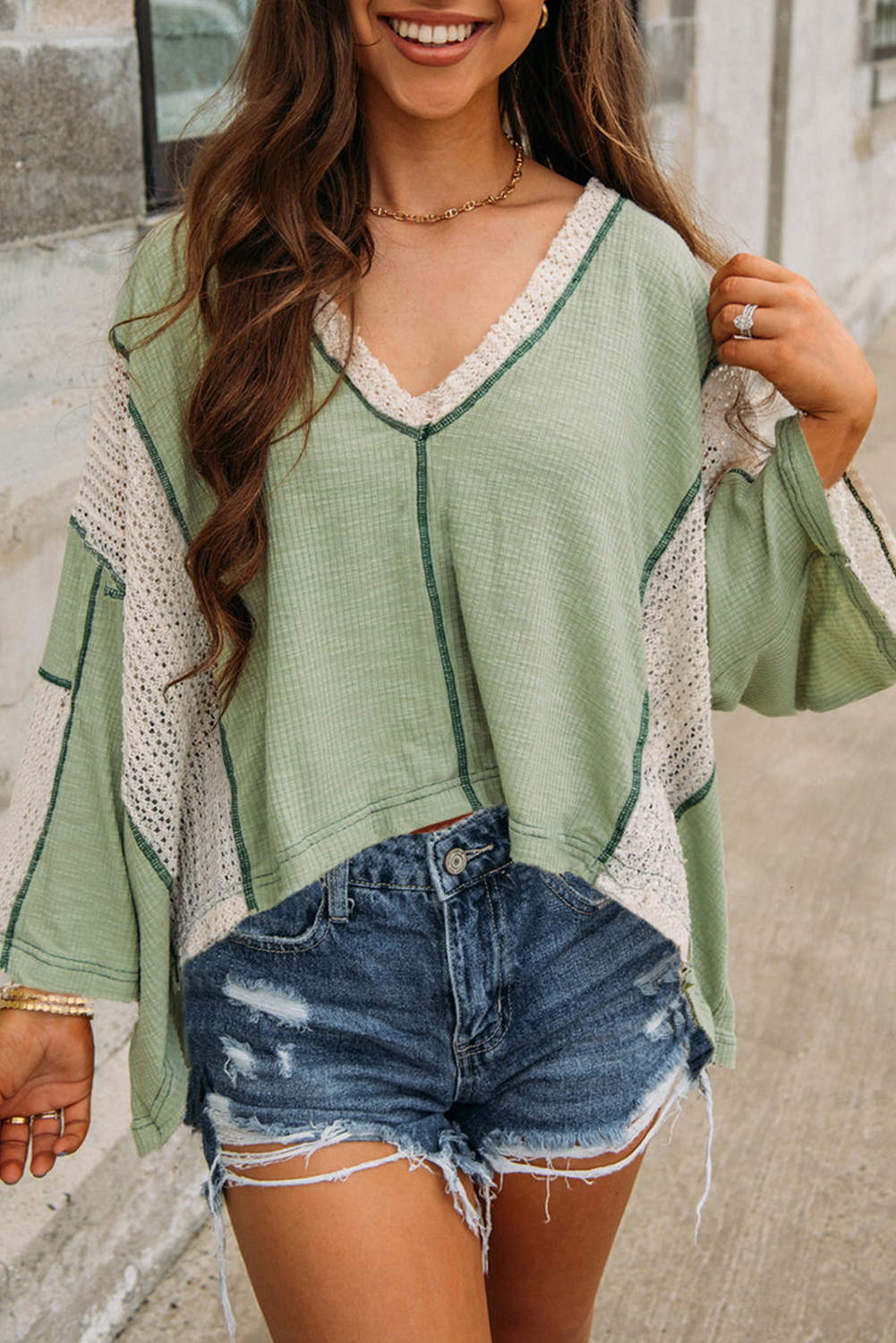 Vintage-Inspired Crochet Detail Knit Top with Exposed Seam and Raw Hemline - Detail View 2 Vintage-Inspired Crochet Detail Knit Top with Exposed Seam and Raw Hemline - Detail View 2