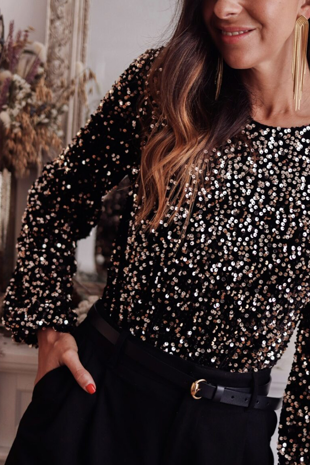 Elevate your style with this stunning Women's Black Sequin Bodysuit. The intricate sequined design adds a touch of glamour, while the deep V back and puff sleeves create a dramatic and elegant look. The round neck balances the bold back and sleeves, perfect for a night out or date. Made from 100% PET, this bodysuit is both comfortable and durable. Whether you're dressing up or dressing down, this bodysuit is the perfect combination of chic and casual. Pair it with your favorite tight jeans, knee-length skirt, or trousers for a stylish and comfortable outfit. - Detail View 4 Elevate your style with this stunning Women's Black Sequin Bodysuit. The intricate sequined design adds a touch of glamour, while the deep V back and puff sleeves create a dramatic and elegant look. The round neck balances the bold back and sleeves, perfect for a night out or date. Made from 100% PET, this bodysuit is both comfortable and durable. Whether you're dressing up or dressing down, this bodysuit is the perfect combination of chic and casual. Pair it with your favorite tight jeans, knee-length skirt, or trousers for a stylish and comfortable outfit. - Detail View 4