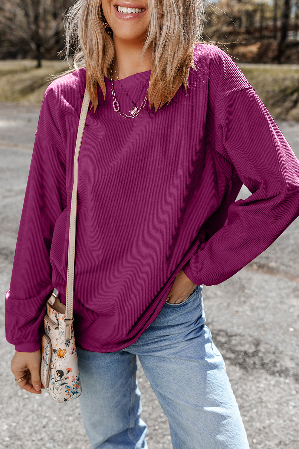 Rock your favorite tunes in style with this Women's Festival Fuchsia Ribbed Corduroy Oversized Sweatshirt. The unique poppy orange corduroy fabric paired with blush pink wording creates a trendy and eye-catching color combination, making it a favorite fashion choice. This oversized sweatshirt offers both comfort and style, suitable for all body shapes and perfect for daily wear. The long sleeves and round neck design provide warmth and coziness, making it ideal for the winter season. Pair it with leggings for a comfortable and relaxed fit, or dress it up with boyfriend jeans and cowboy boots for a fashionable and chic look. Made from premium 100% polyester, this sweatshirt ensures durability and long-lasting wear. Stay casual and fashionable in all seasons with this versatile and stylish sweatshirt. - Detail View 4 Rock your favorite tunes in style with this Women's Festival Fuchsia Ribbed Corduroy Oversized Sweatshirt. The unique poppy orange corduroy fabric paired with blush pink wording creates a trendy and eye-catching color combination, making it a favorite fashion choice. This oversized sweatshirt offers both comfort and style, suitable for all body shapes and perfect for daily wear. The long sleeves and round neck design provide warmth and coziness, making it ideal for the winter season. Pair it with leggings for a comfortable and relaxed fit, or dress it up with boyfriend jeans and cowboy boots for a fashionable and chic look. Made from premium 100% polyester, this sweatshirt ensures durability and long-lasting wear. Stay casual and fashionable in all seasons with this versatile and stylish sweatshirt. - Detail View 4